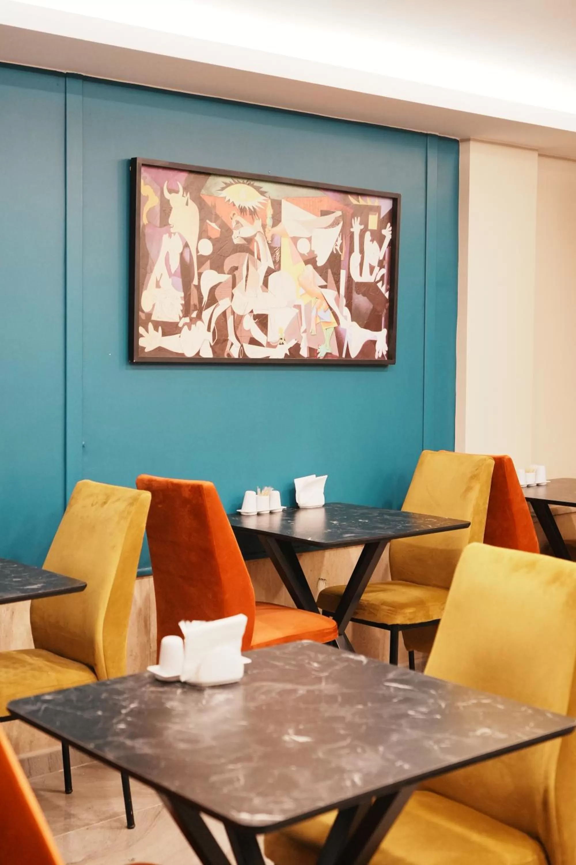 Dining area in Reyyan Hotel