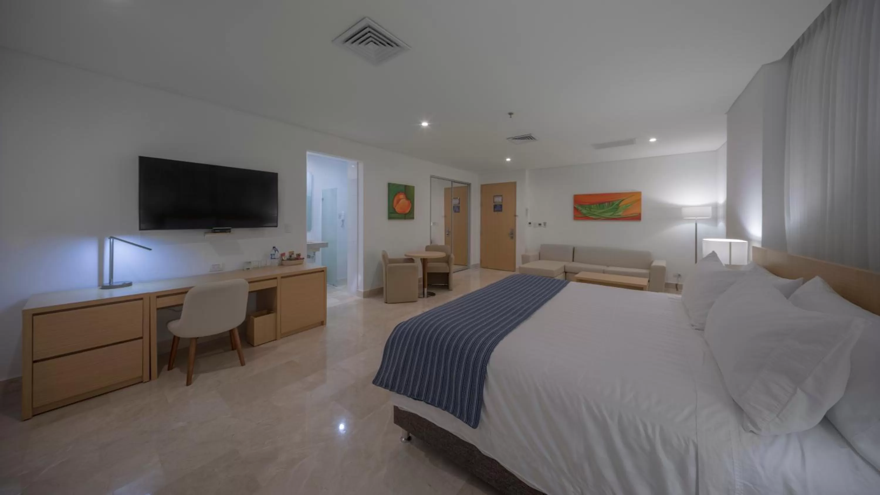 Photo of the whole room, Bed in Hotel Dann Carlton Barranquilla y Centro de Convenciones