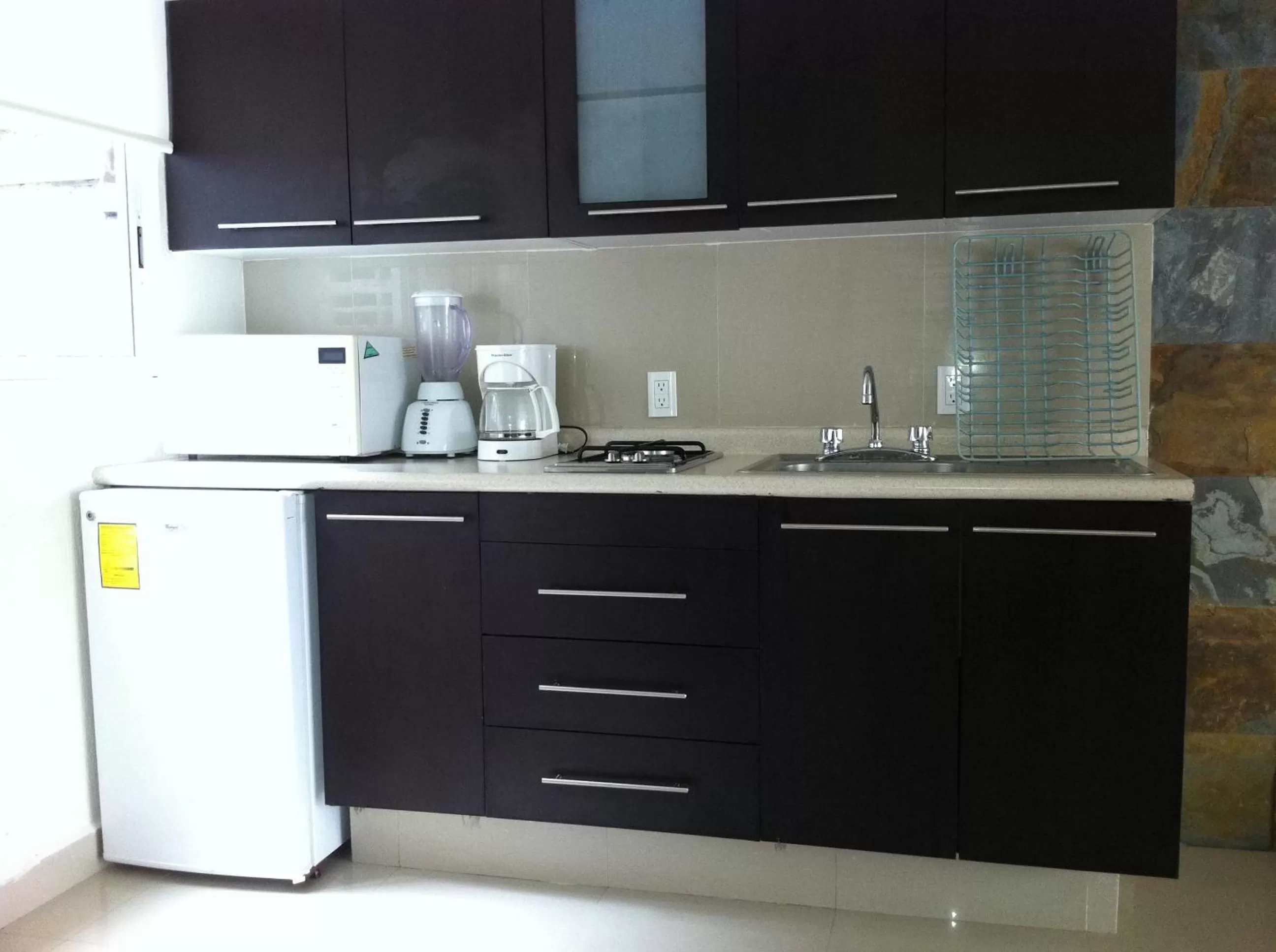 Kitchen or kitchenette in Grupo Kings Suites - Monte Chimborazo 567