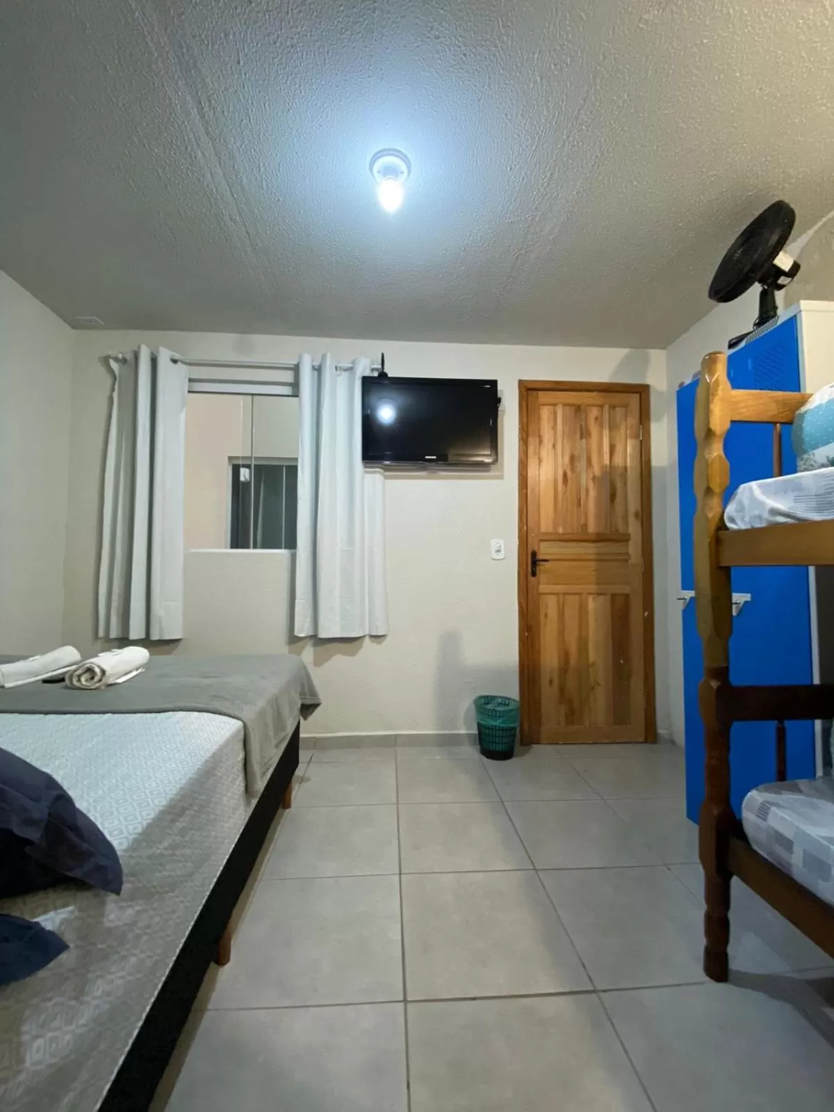 TV/Entertainment Center in Nova Pousada Consulado