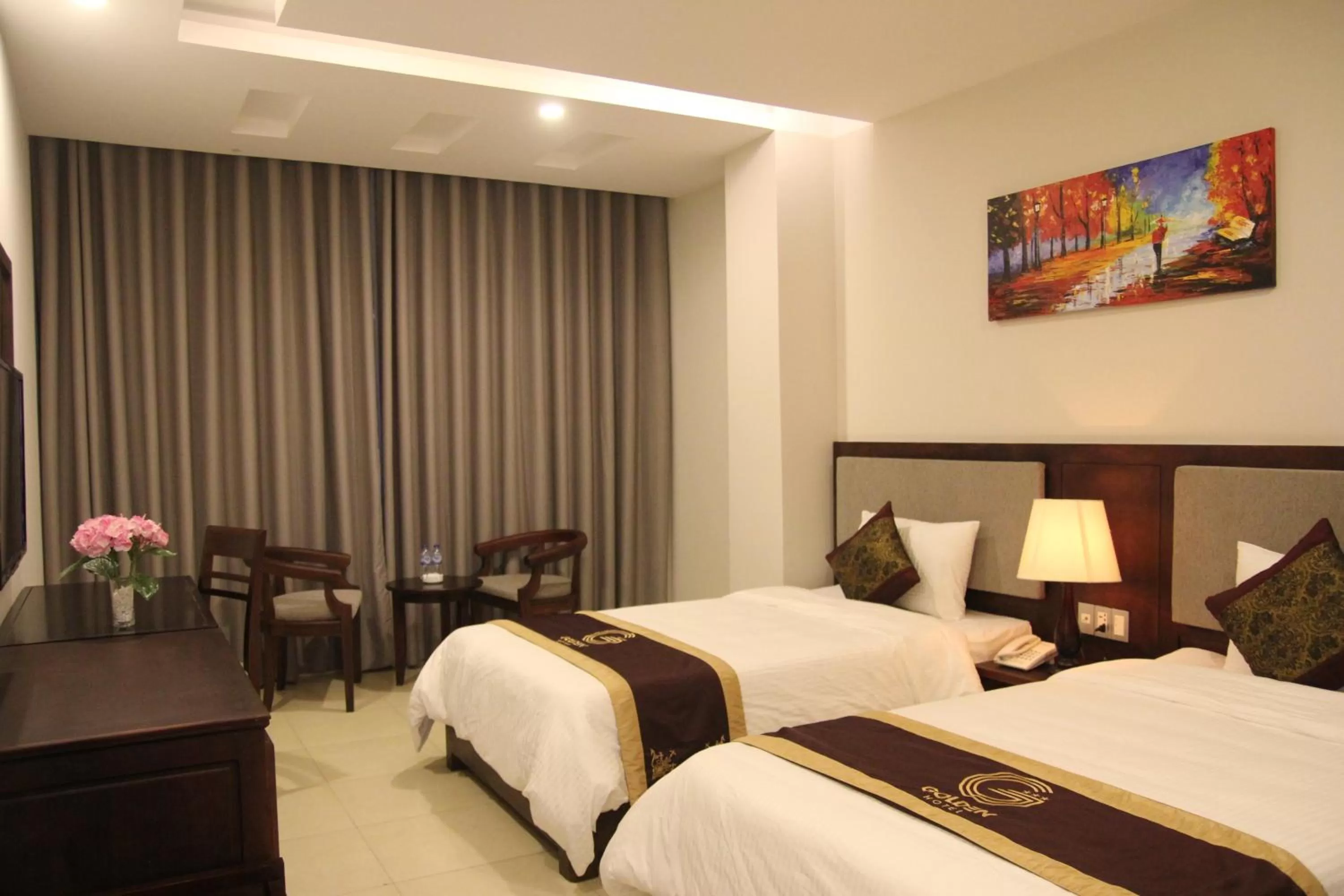 Bed in Golden Quang Tri Hotel