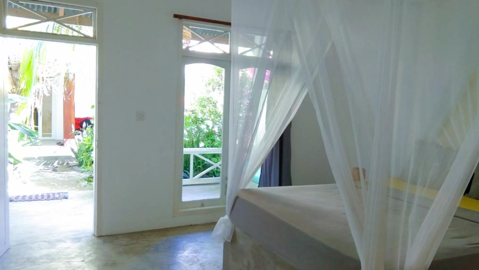 Bed in Café des Arts Gili Air
