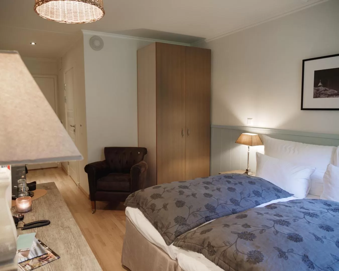 Seating area, Bed in Strand Hotel Fevik - by Classic Norway Hotels