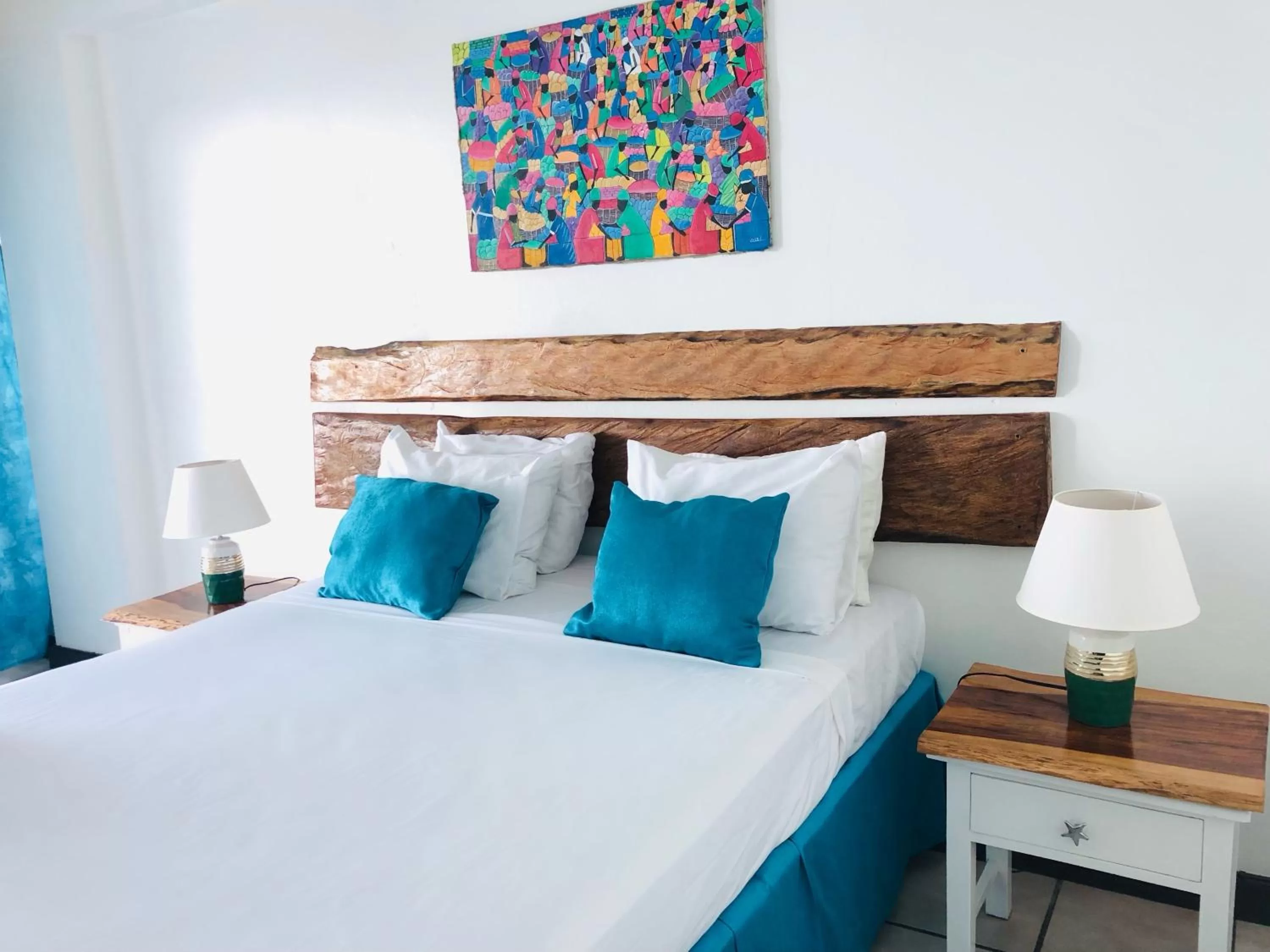 Bed in Sand and Tan Beach Hotel