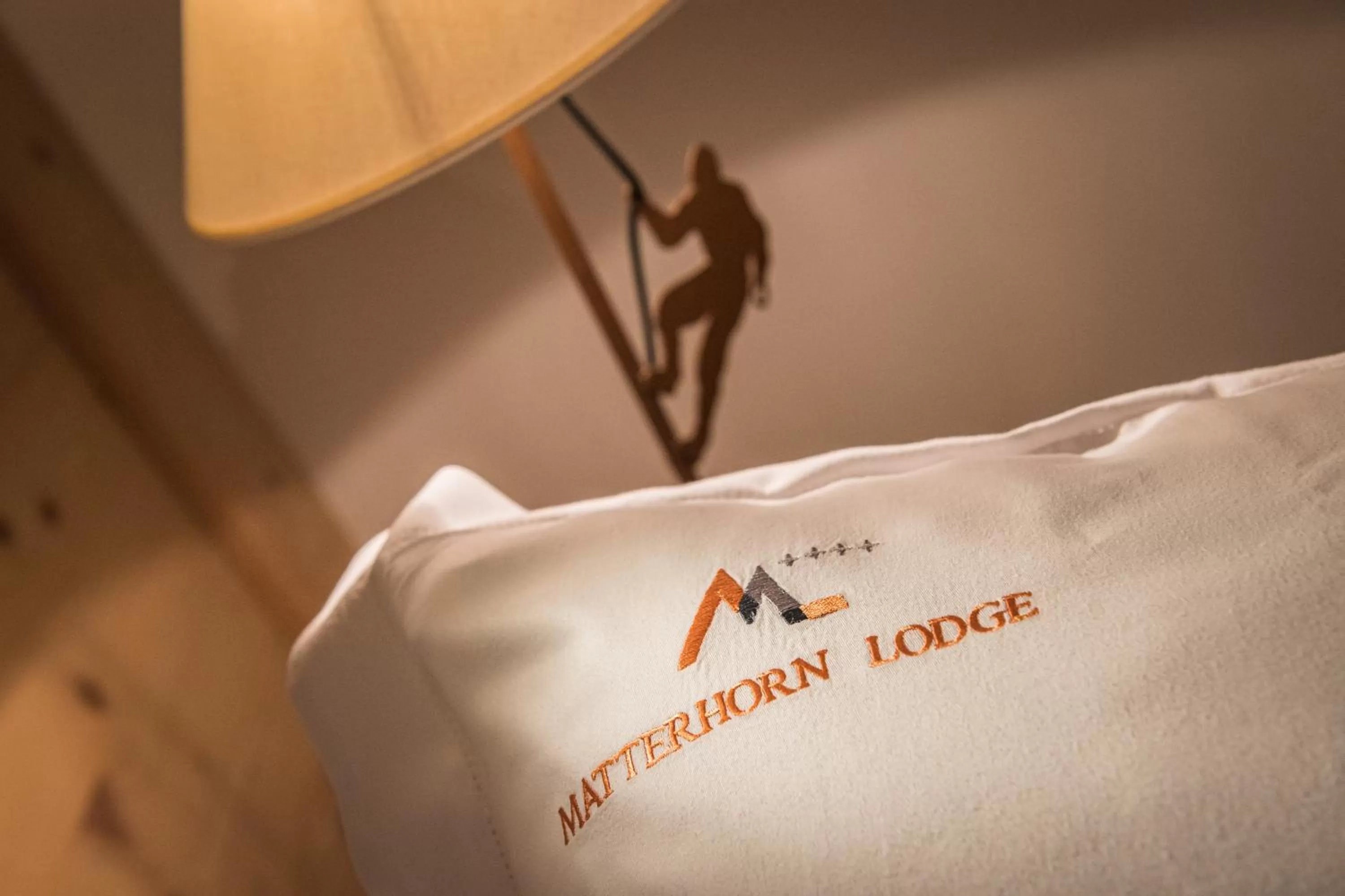 Decorative detail, Bed in Matterhorn Lodge Boutique Hotel & Apartments