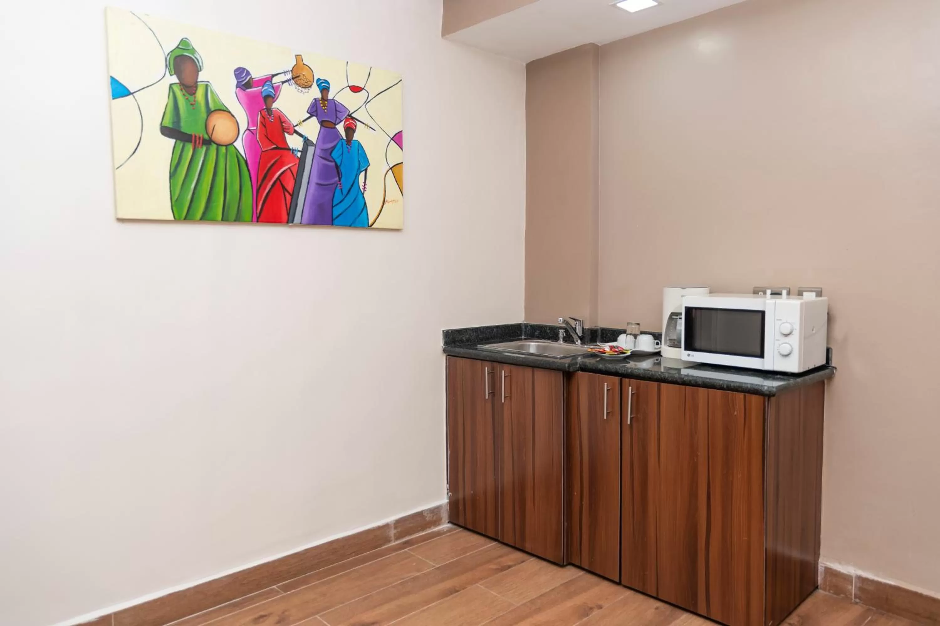 Kitchen or kitchenette in Hawthorn Suites by Wyndham Abuja