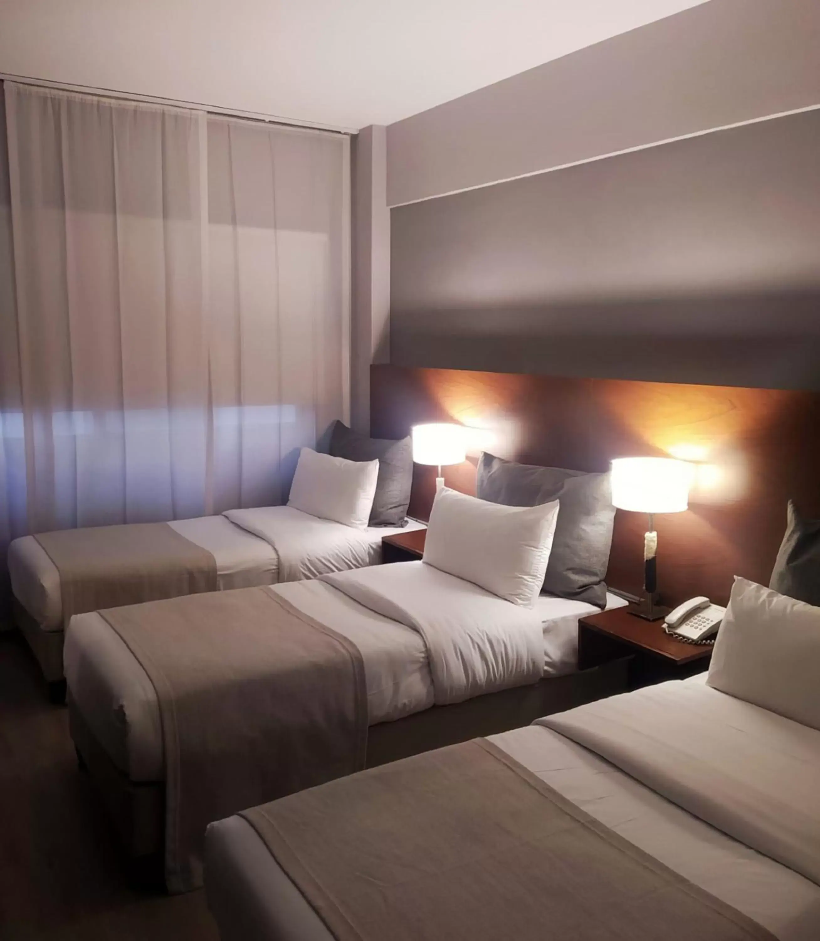 Triple Room in Rochester Hotel Concept Triple Room in Rochester Hotel Concept