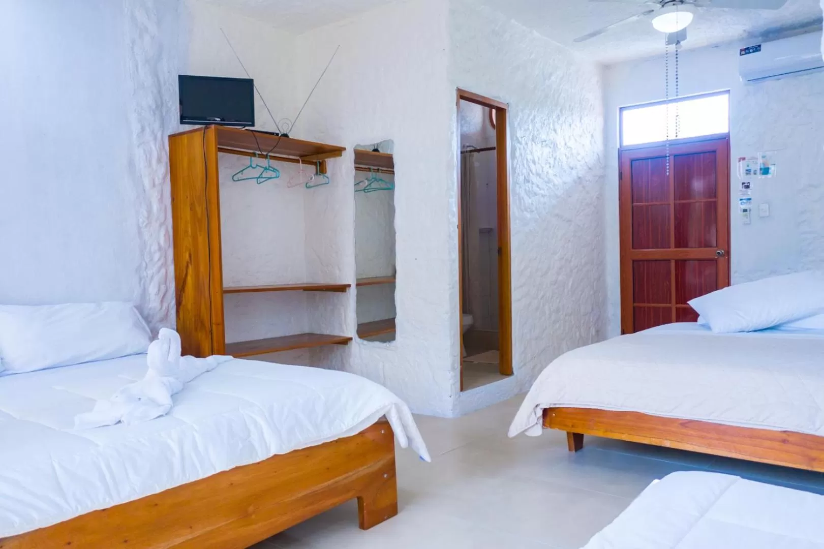 Bed in Royal Galápagos Inn