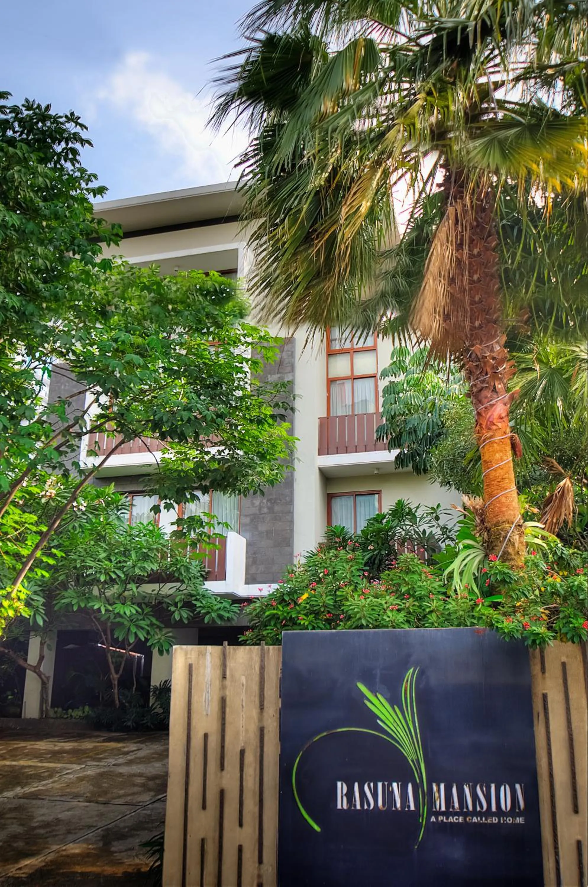 Property logo or sign in Rasuna Mansion