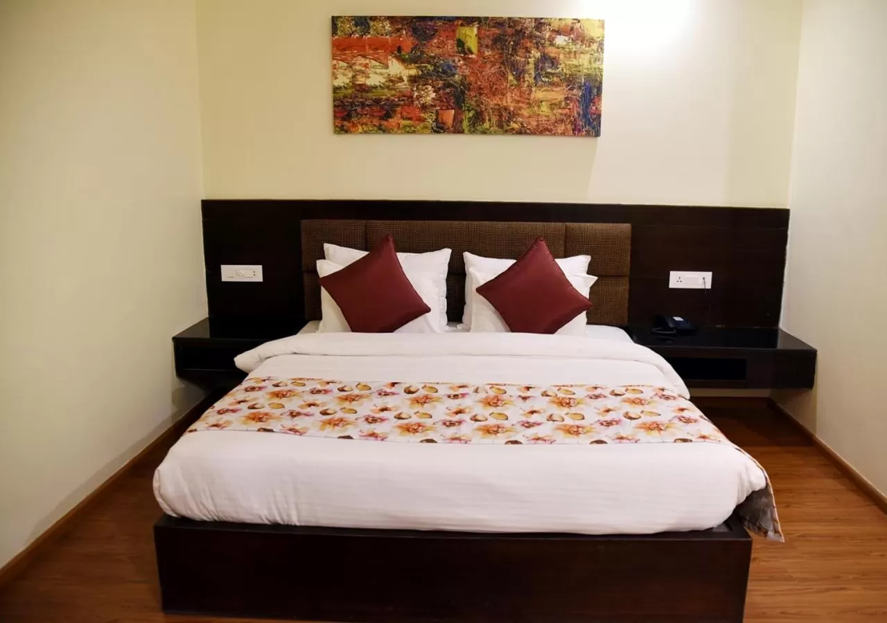 Bed in Clarks Inn Suites Katra