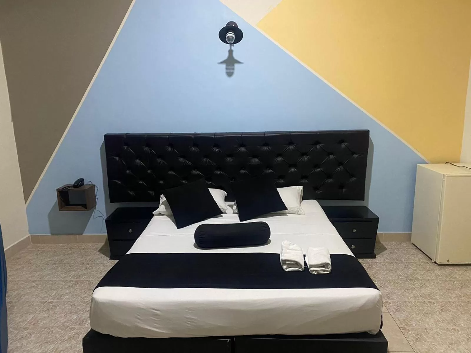 Bed in HOTEL CALLE REAL SUITE