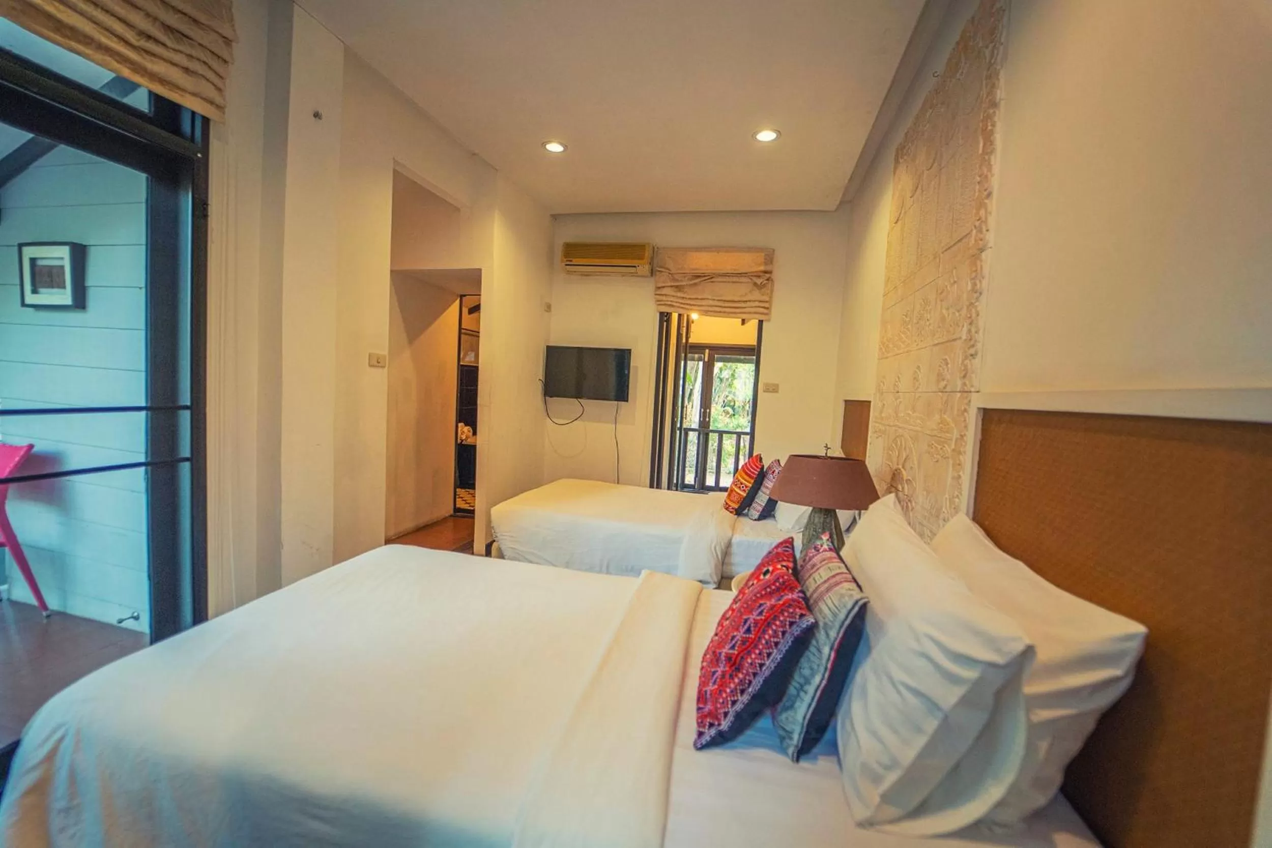 Bed in Baan Suan Residence เฮือนพักบ้านสวน