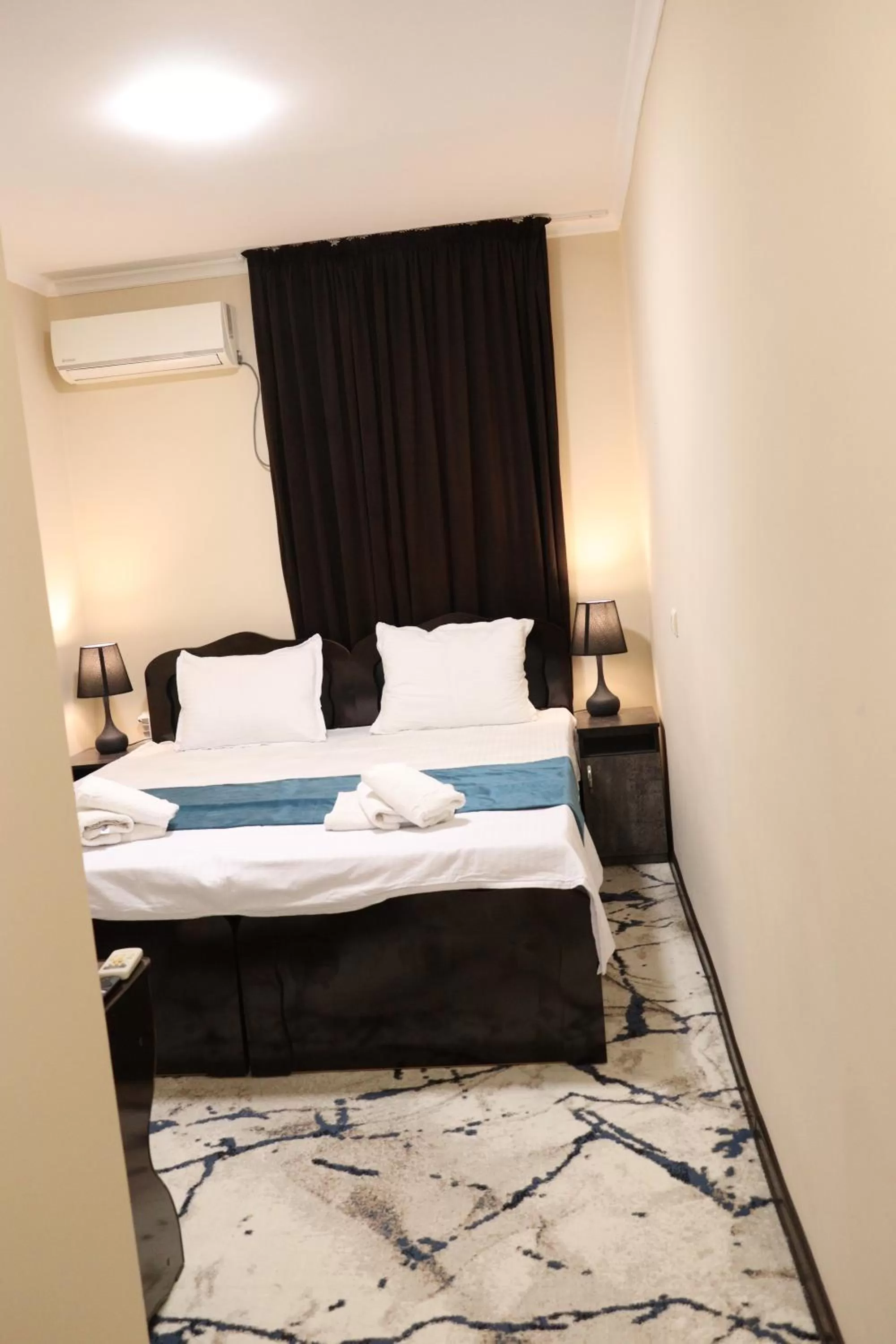 Photo of the whole room, Bed in Al Bukhari