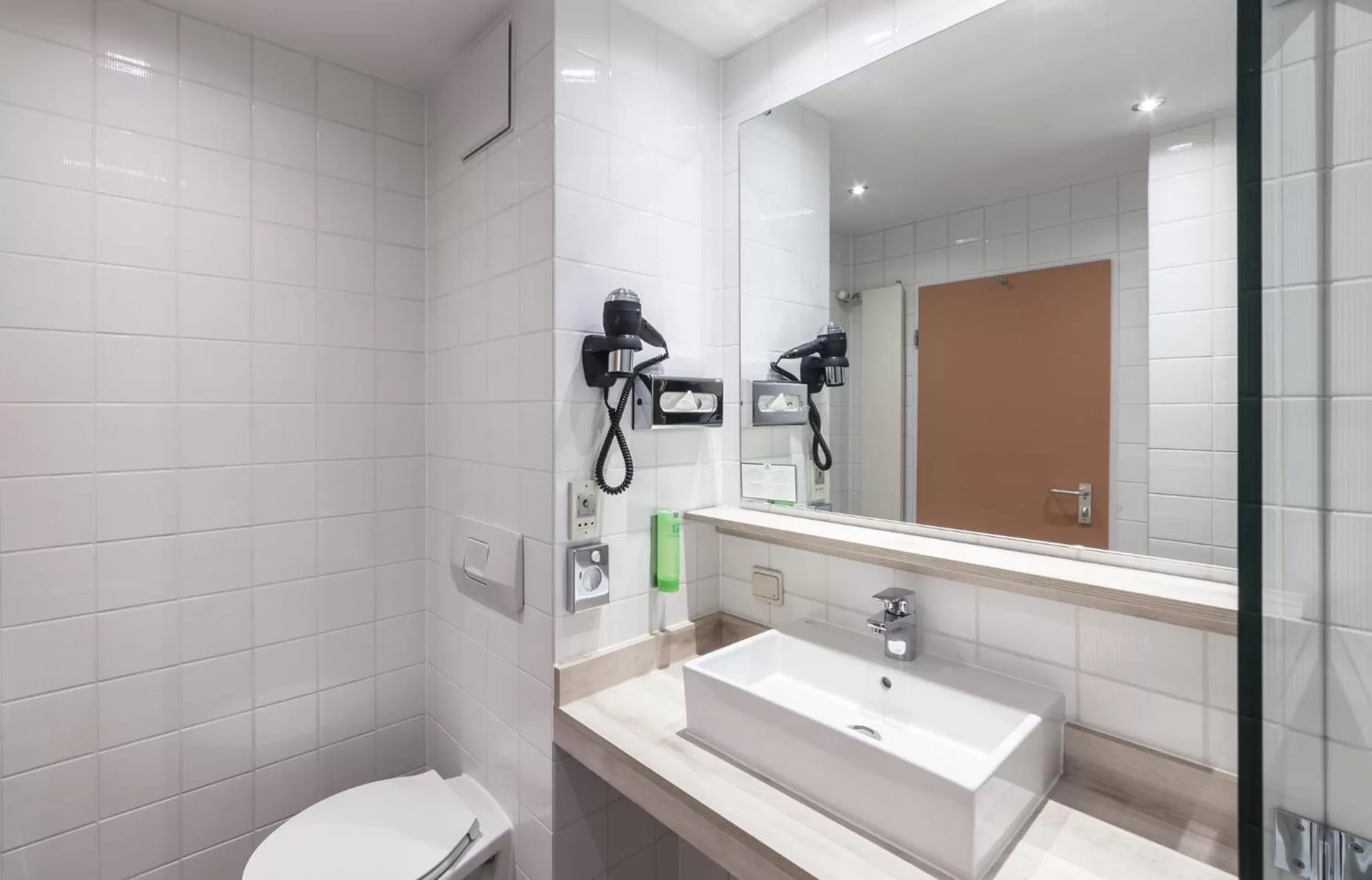 Bathroom in Holiday Inn Munich - South by IHG