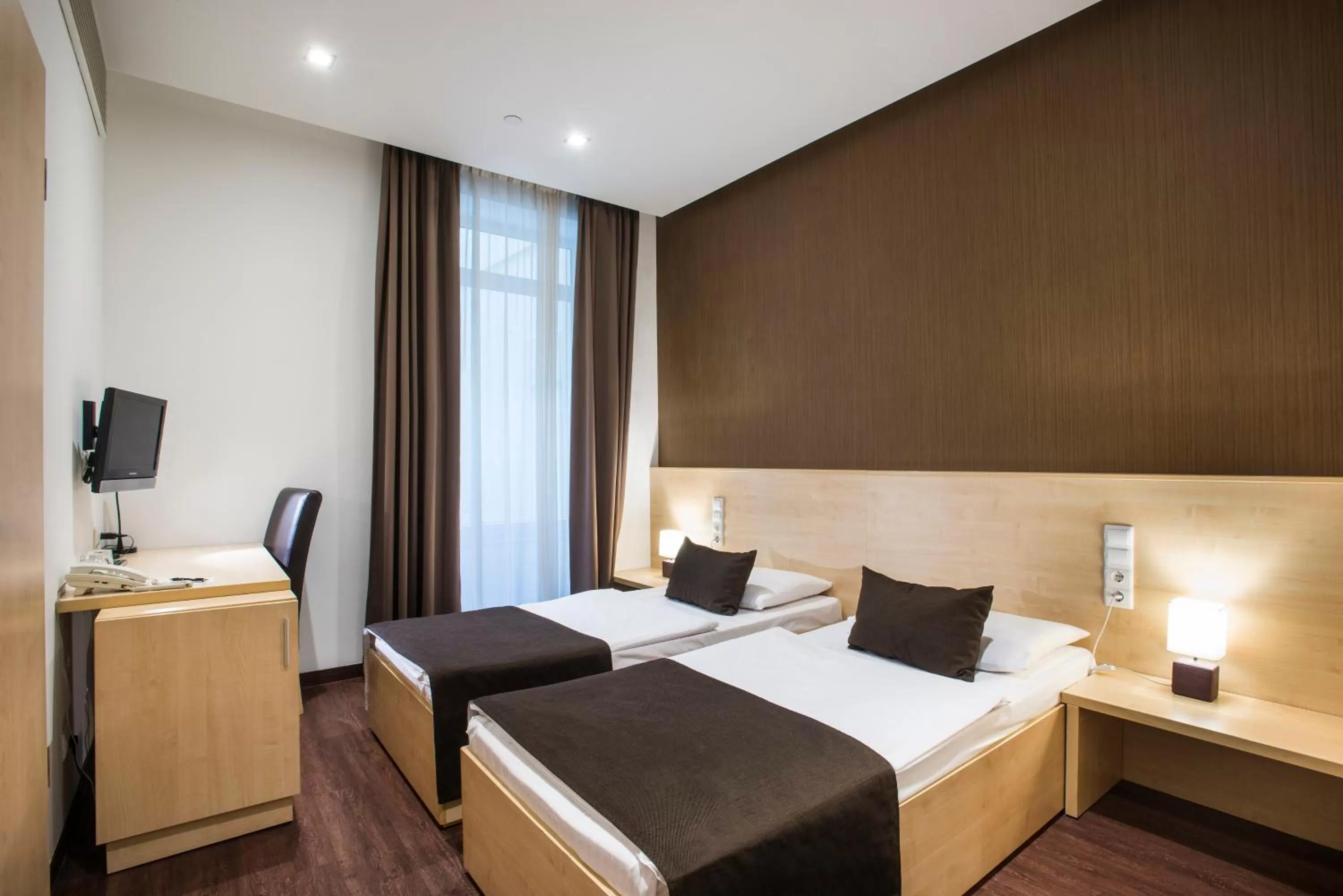 Bedroom, Bed in Promenade City Hotel