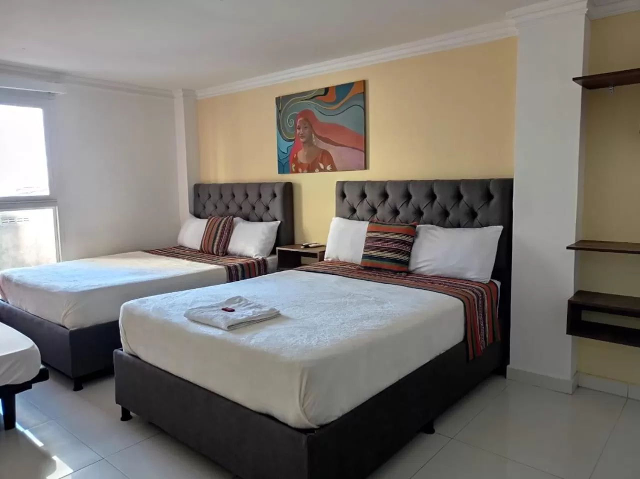 Bed in ANAJIRAWAA HOTEL