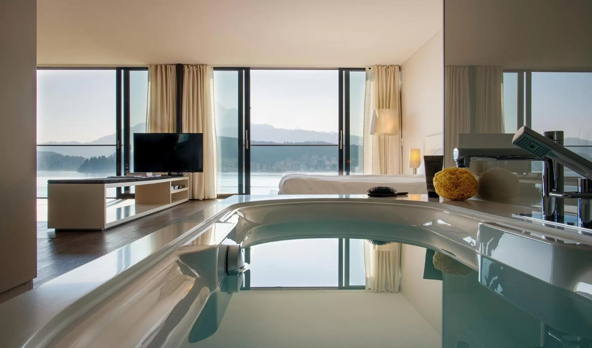Photo of the whole room in HERMITAGE Lake Lucerne - Beach Club & Lifestyle Hotel