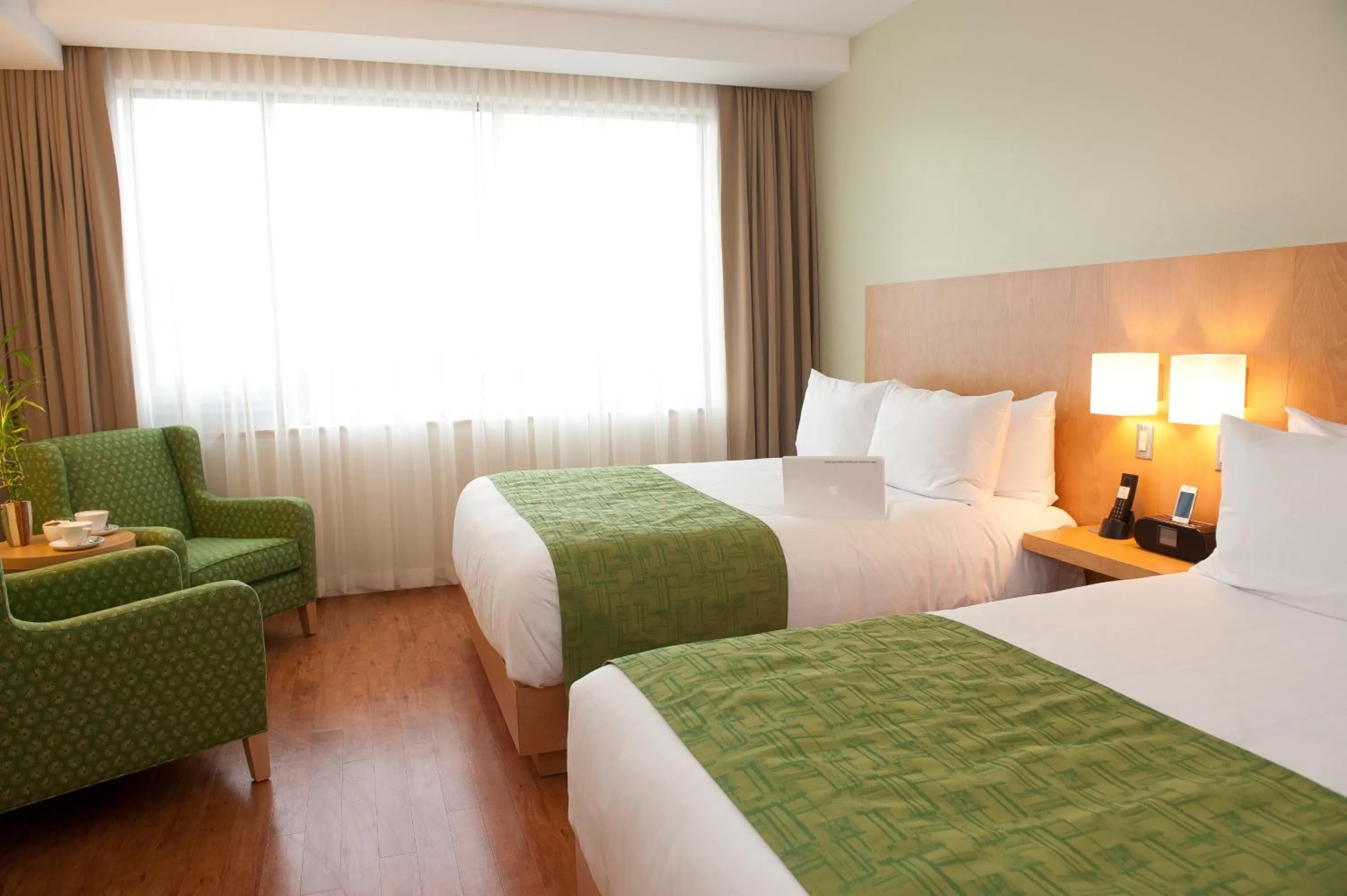 Bed in The Holman Grand Hotel