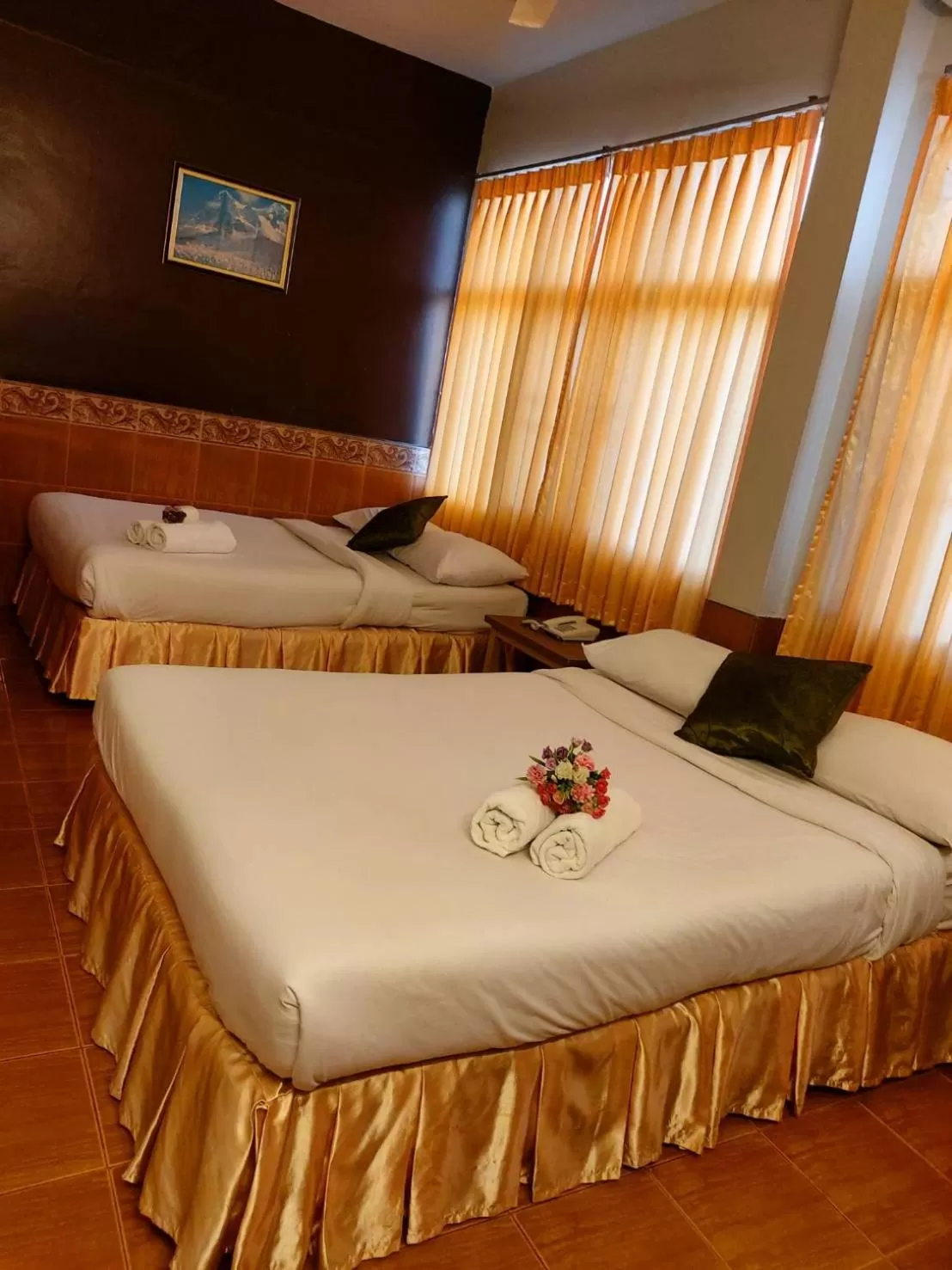 Photo of the whole room, Bed in Suriwong Chumphon Hotel