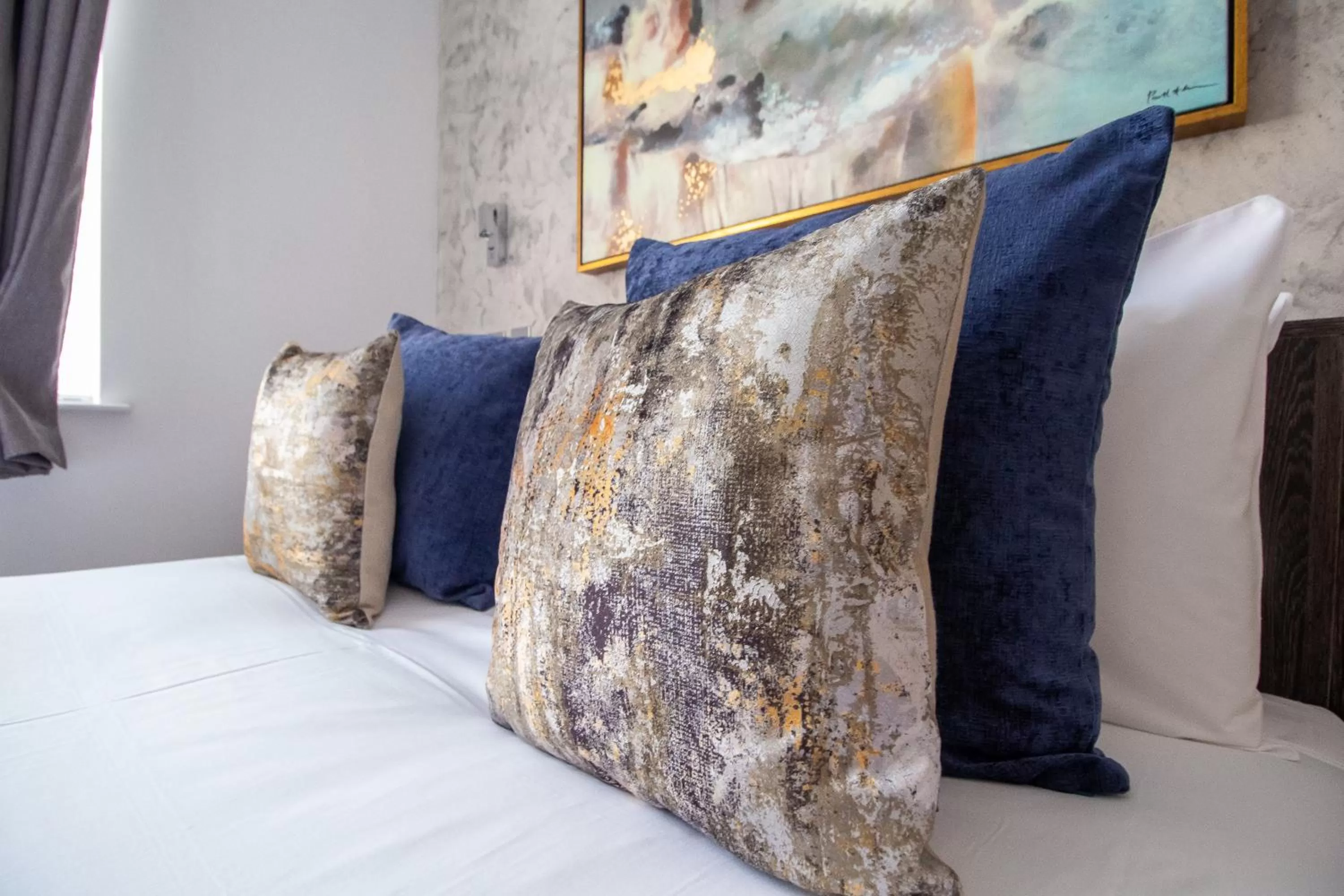 Bed in Signature Suites