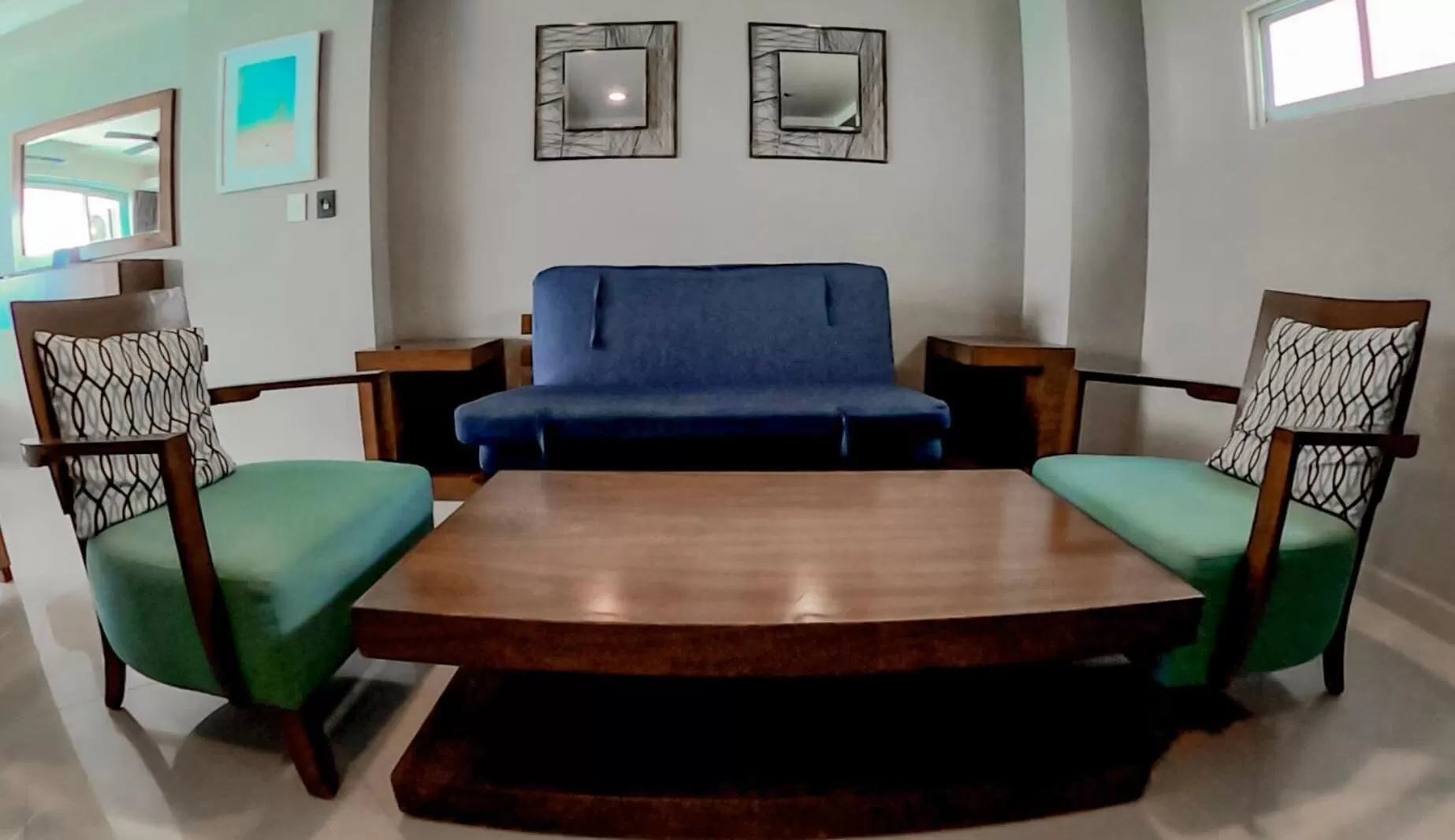 Living room in Ocean Dream Cancun by GuruHotel