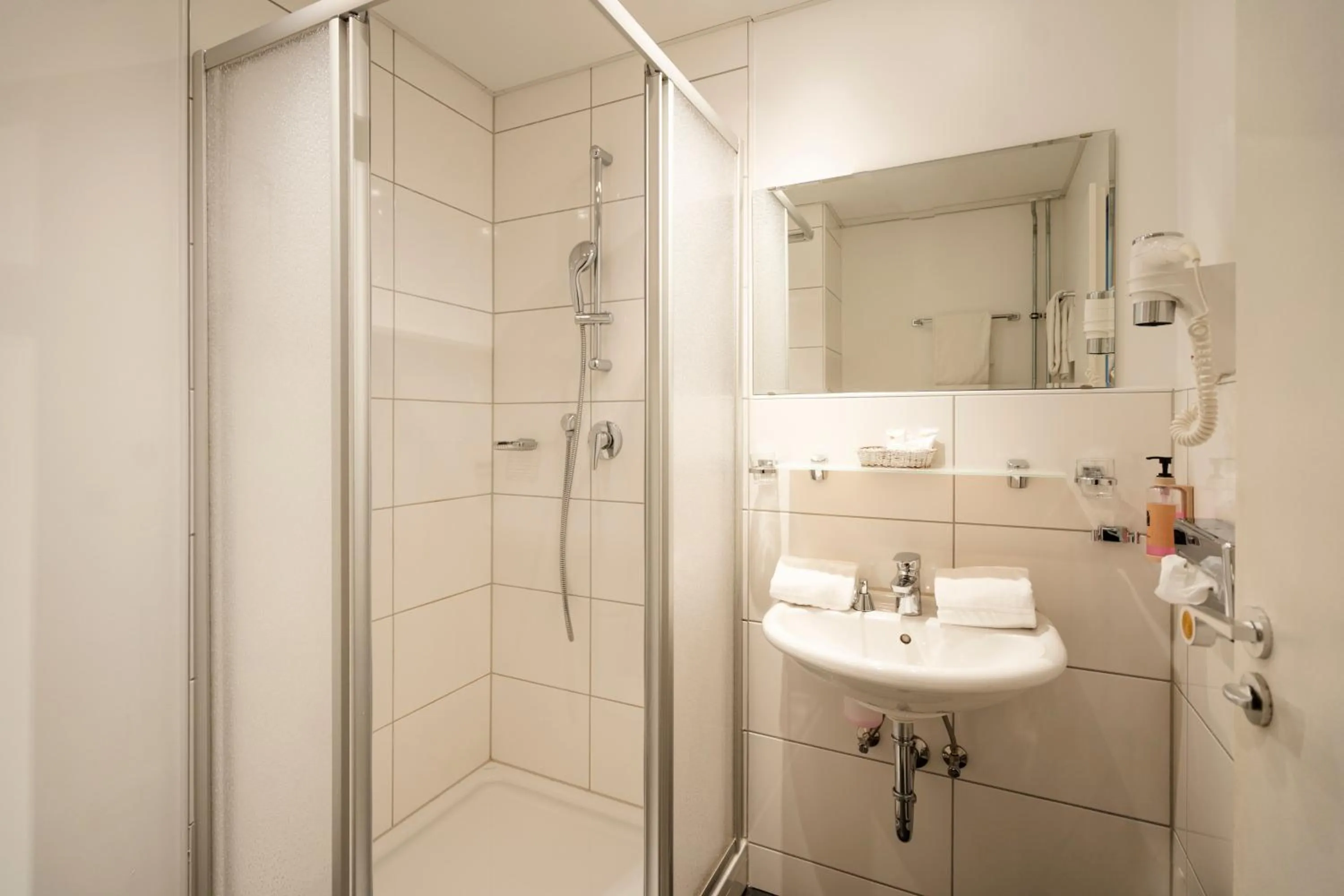 Bathroom in Caravelle Hotel im Park