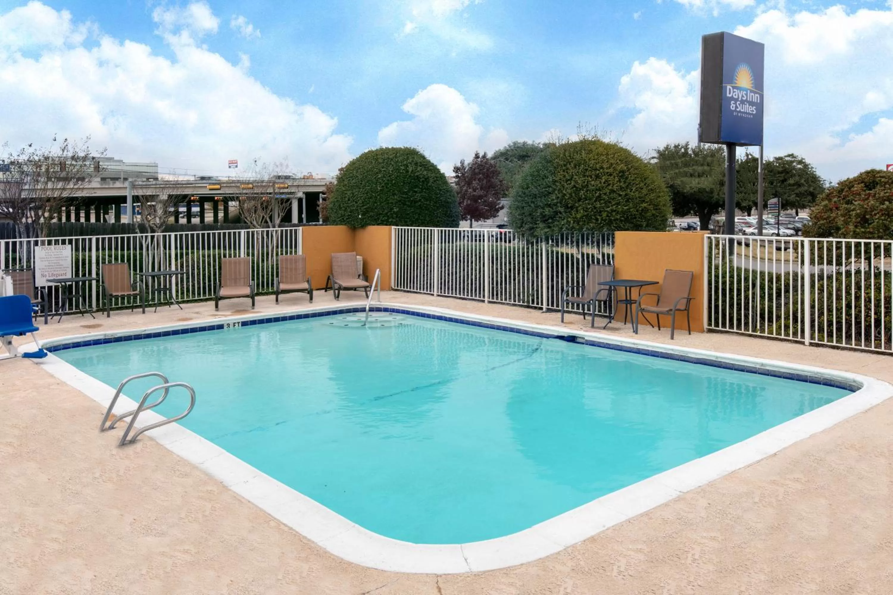 Pool view in Days Inn & Suites by Wyndham Arlington Near Six Flags