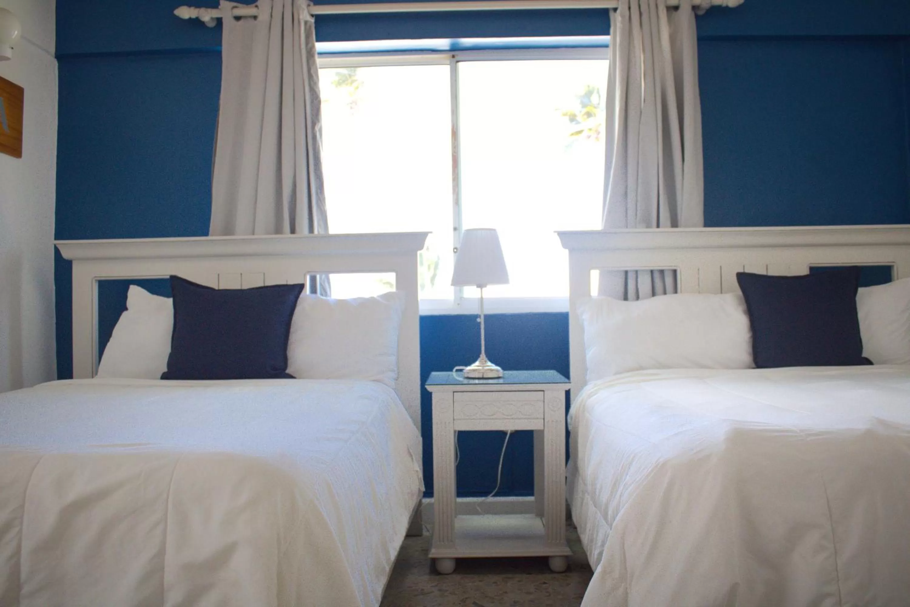 Bedroom, Bed in Hotel Checkin El Cortecito Beach