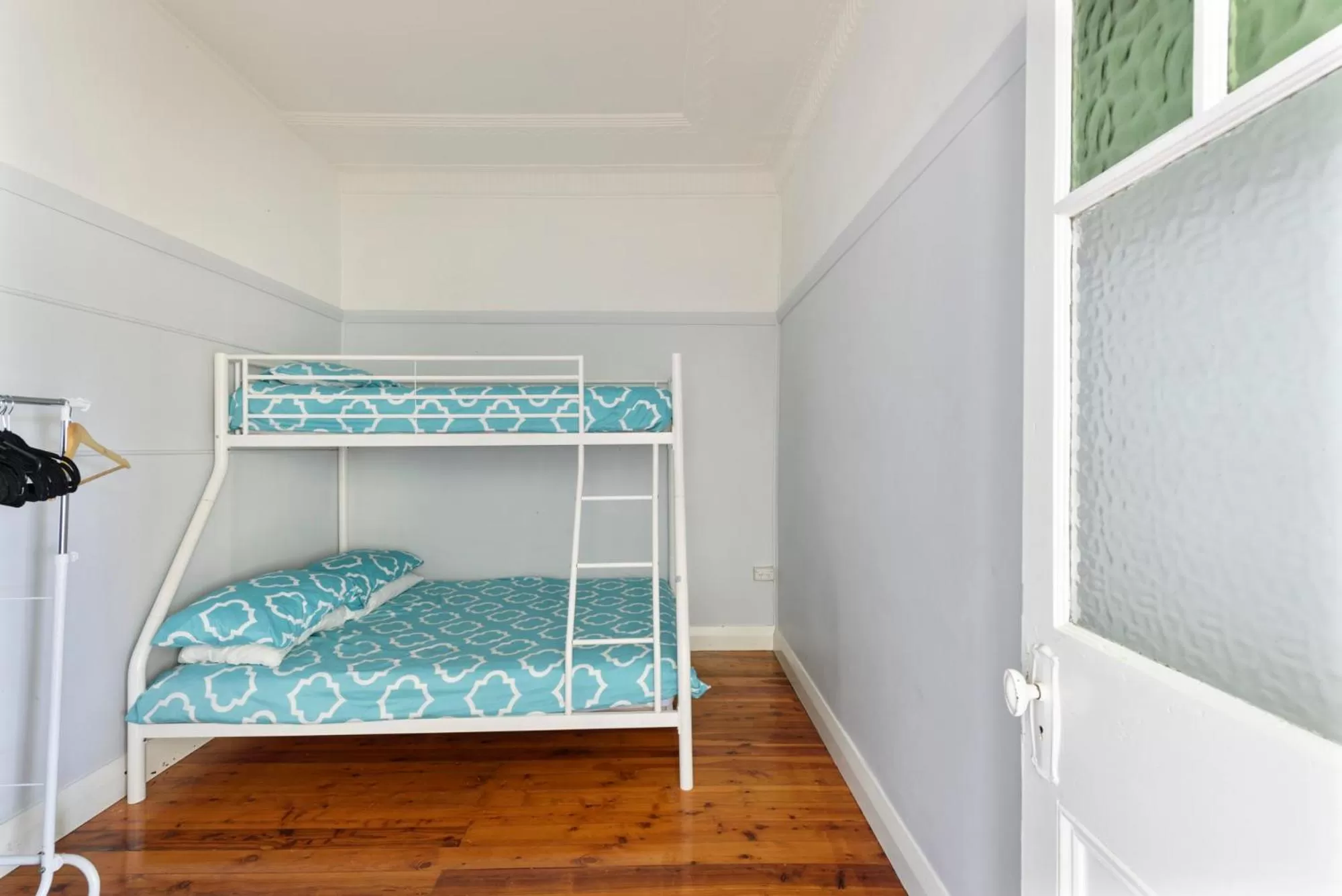 Bed in Calm Waters Waterfront Cottages