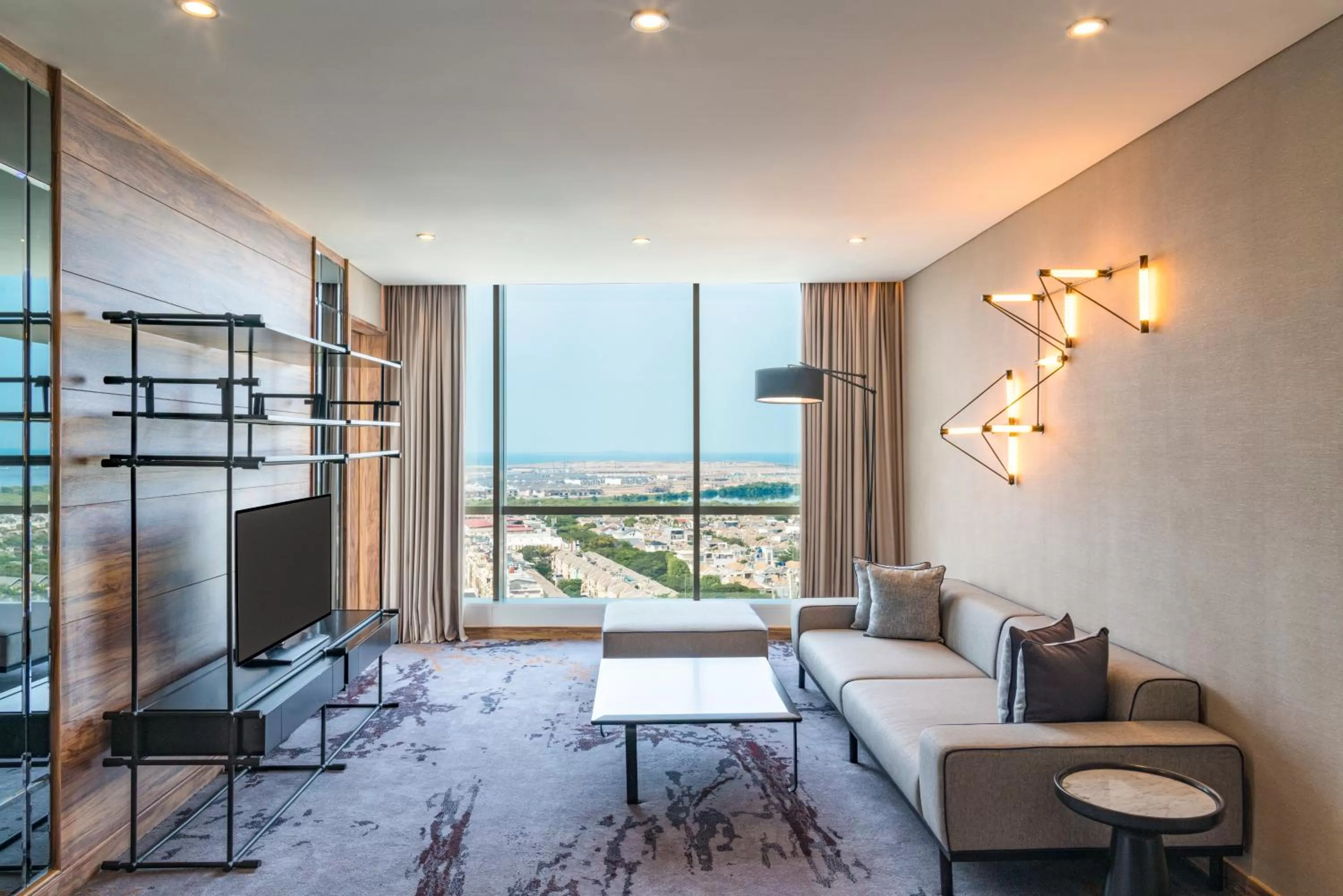 Living room in Swissôtel Jakarta PIK Avenue