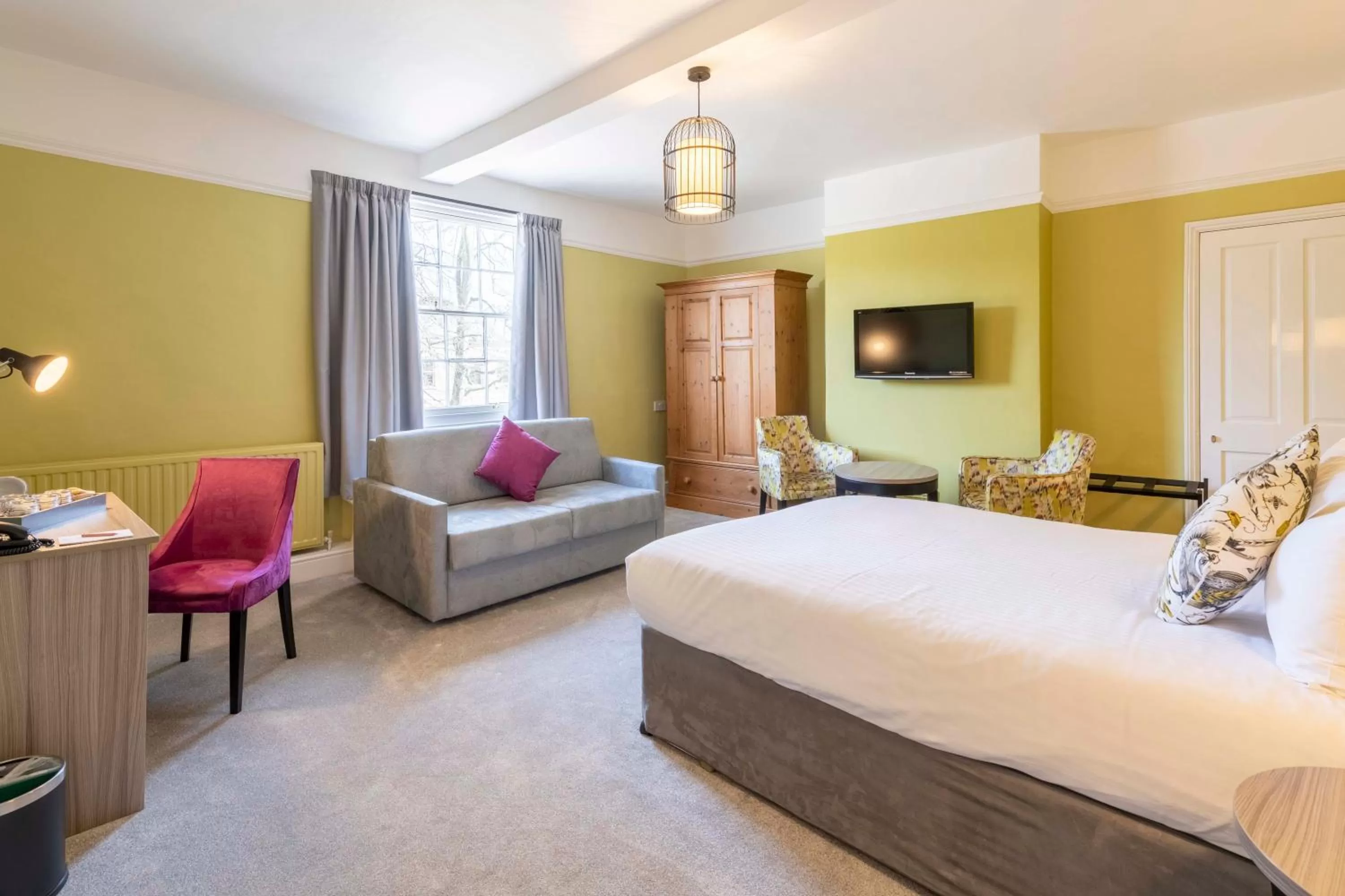 Bed in Wisteria Hotel