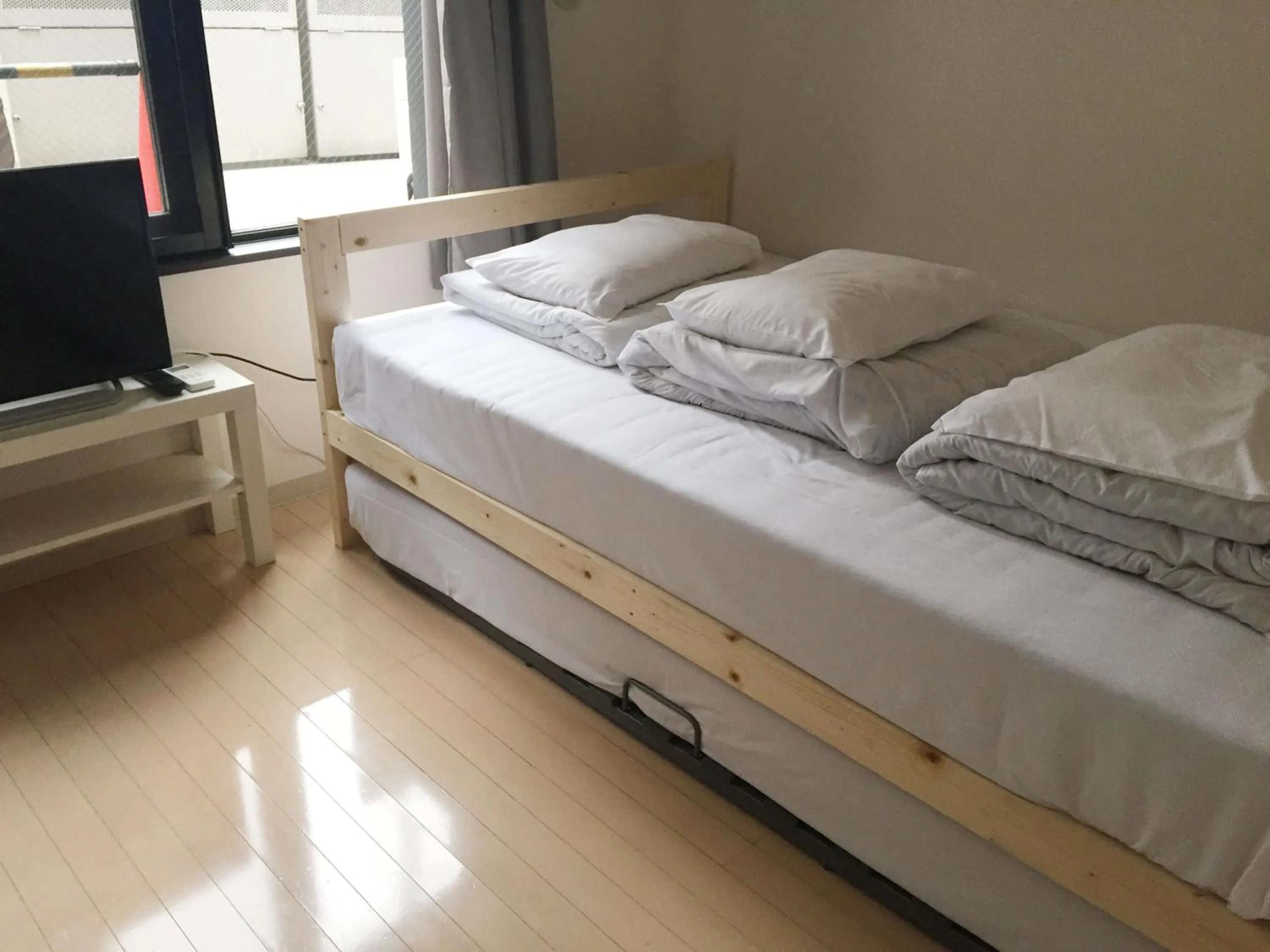 Bed in Sophiearth Apartment