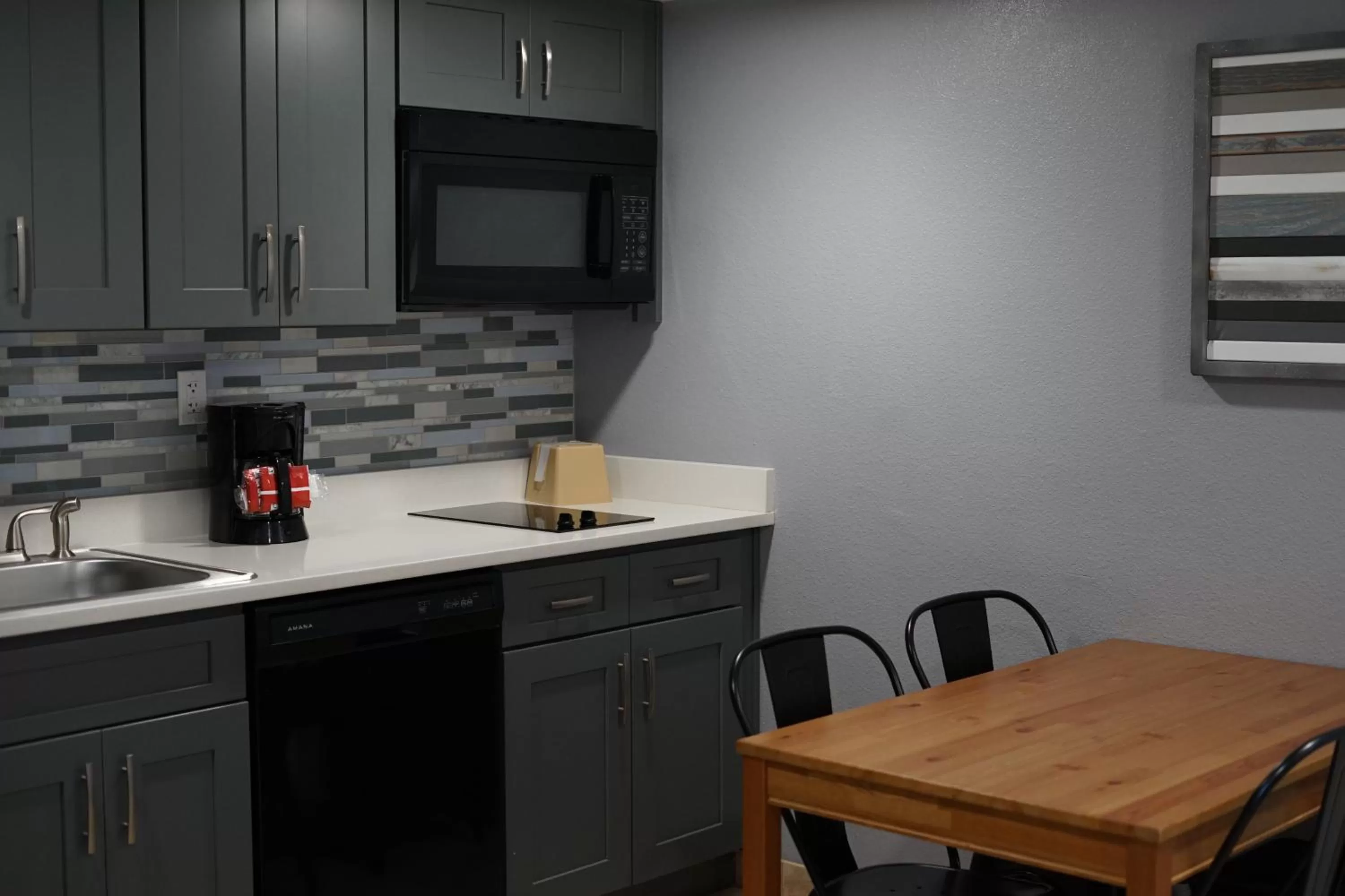 Kitchen or kitchenette in Celebration Suites