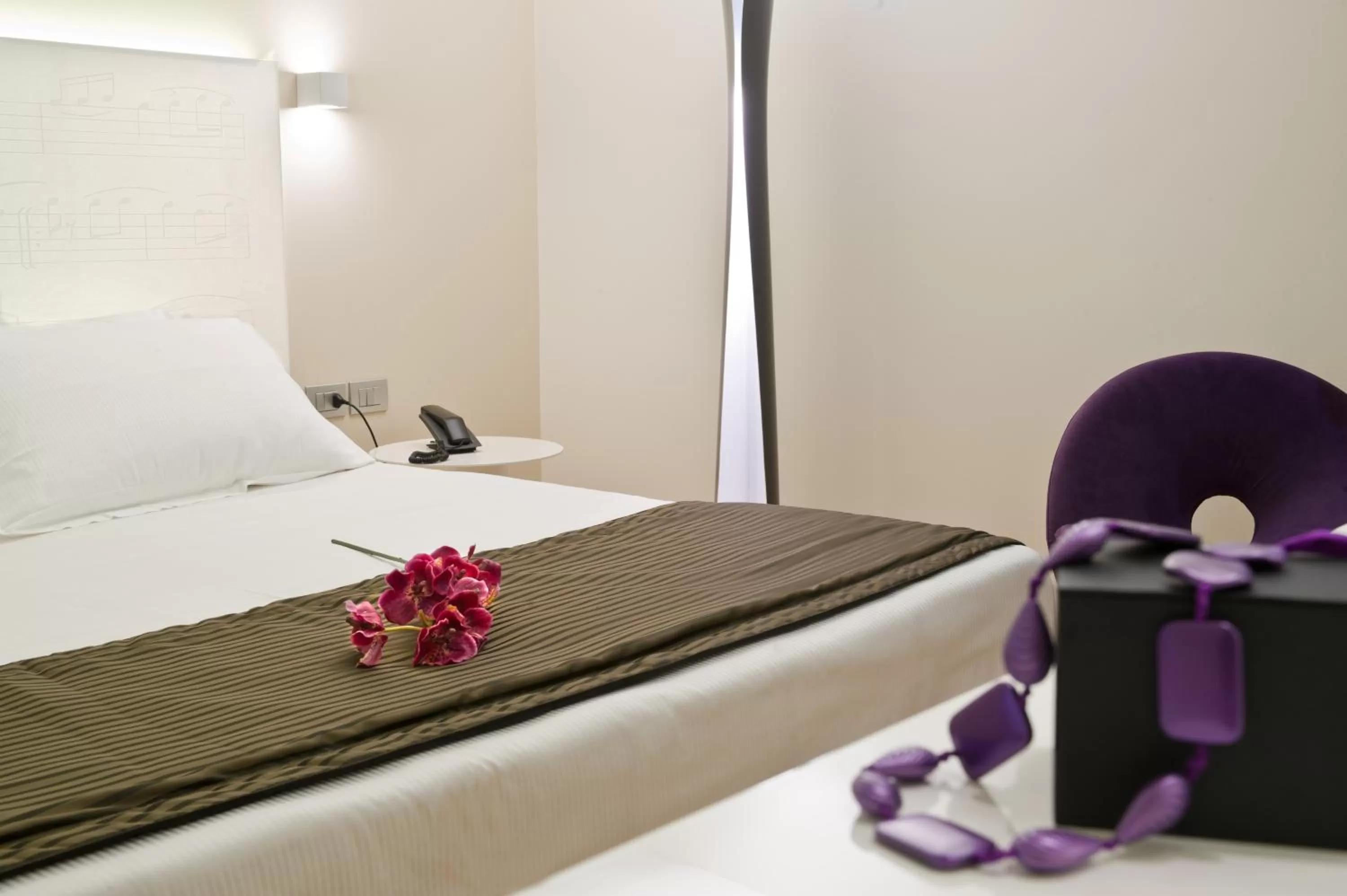 Decorative detail, Bed in Hotel Coppe Trieste - Boutique Hotel