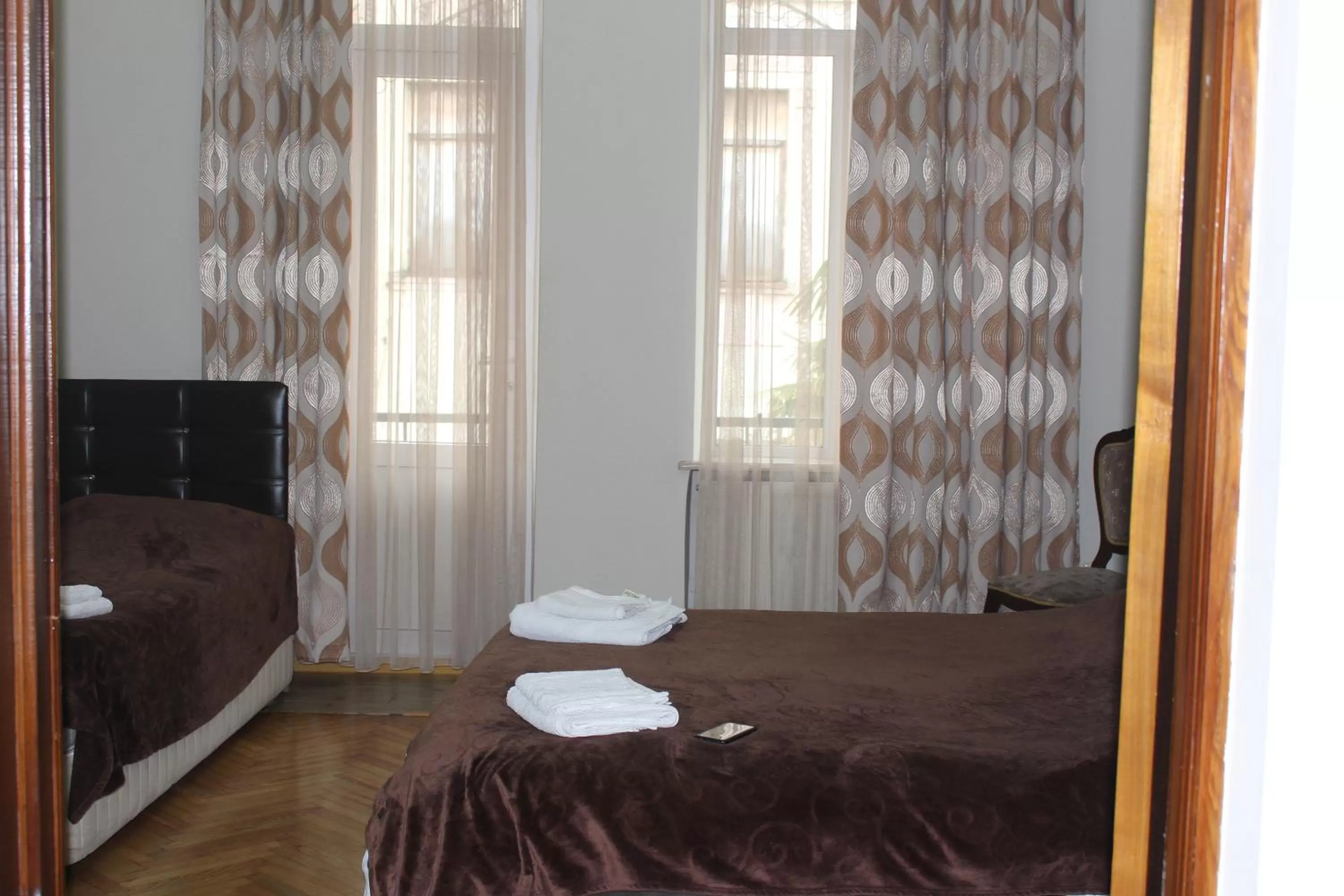 Photo of the whole room, Bed in CATTALEYA