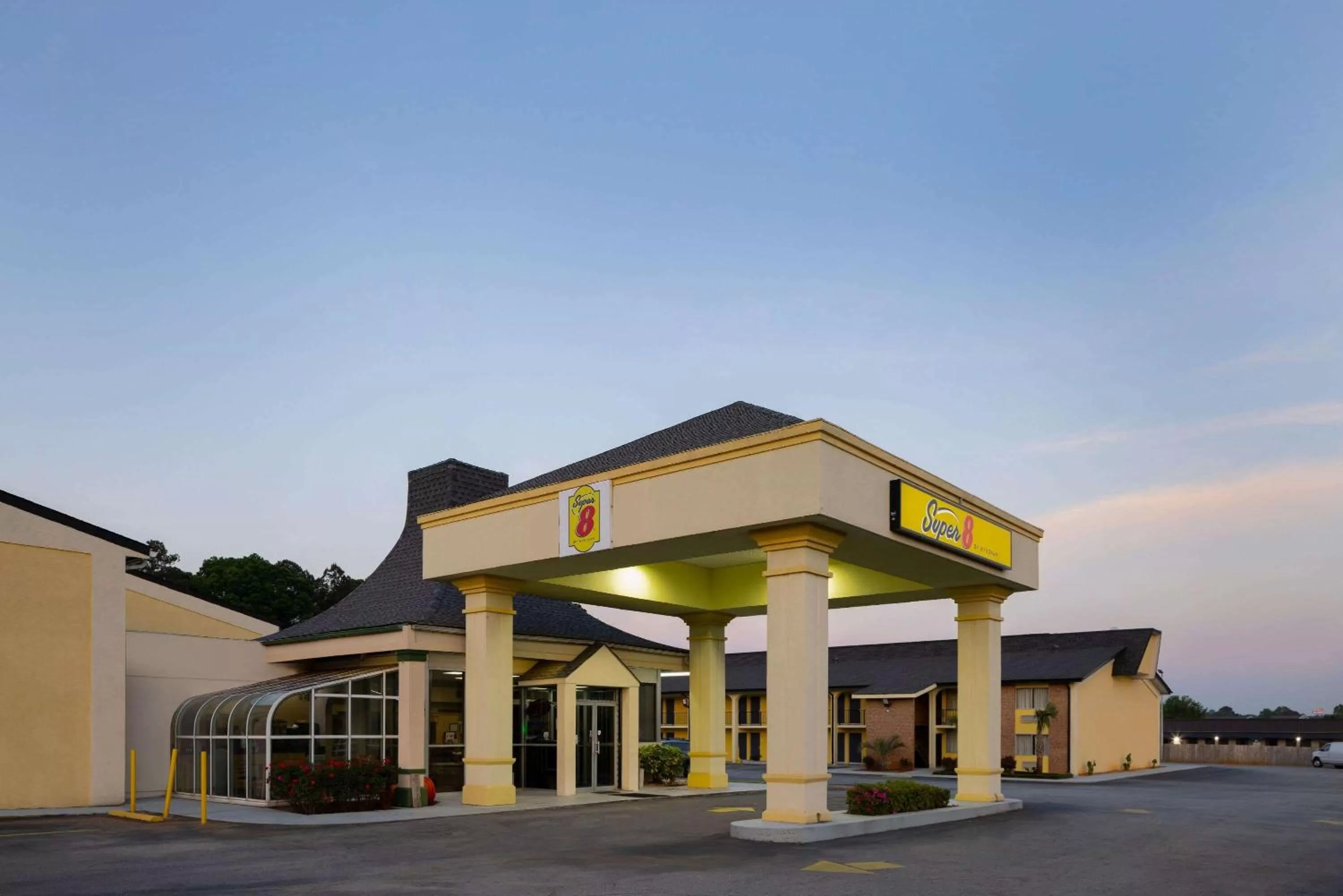 Property building in Super 8 by Wyndham McDonough GA