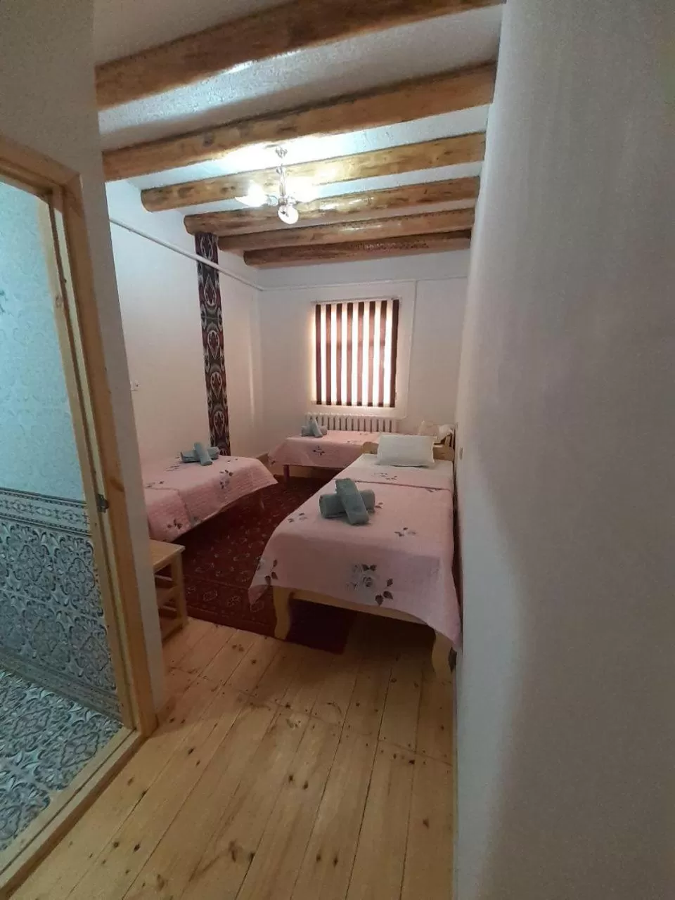 Bed in KHIVA ABDULLA Guest House