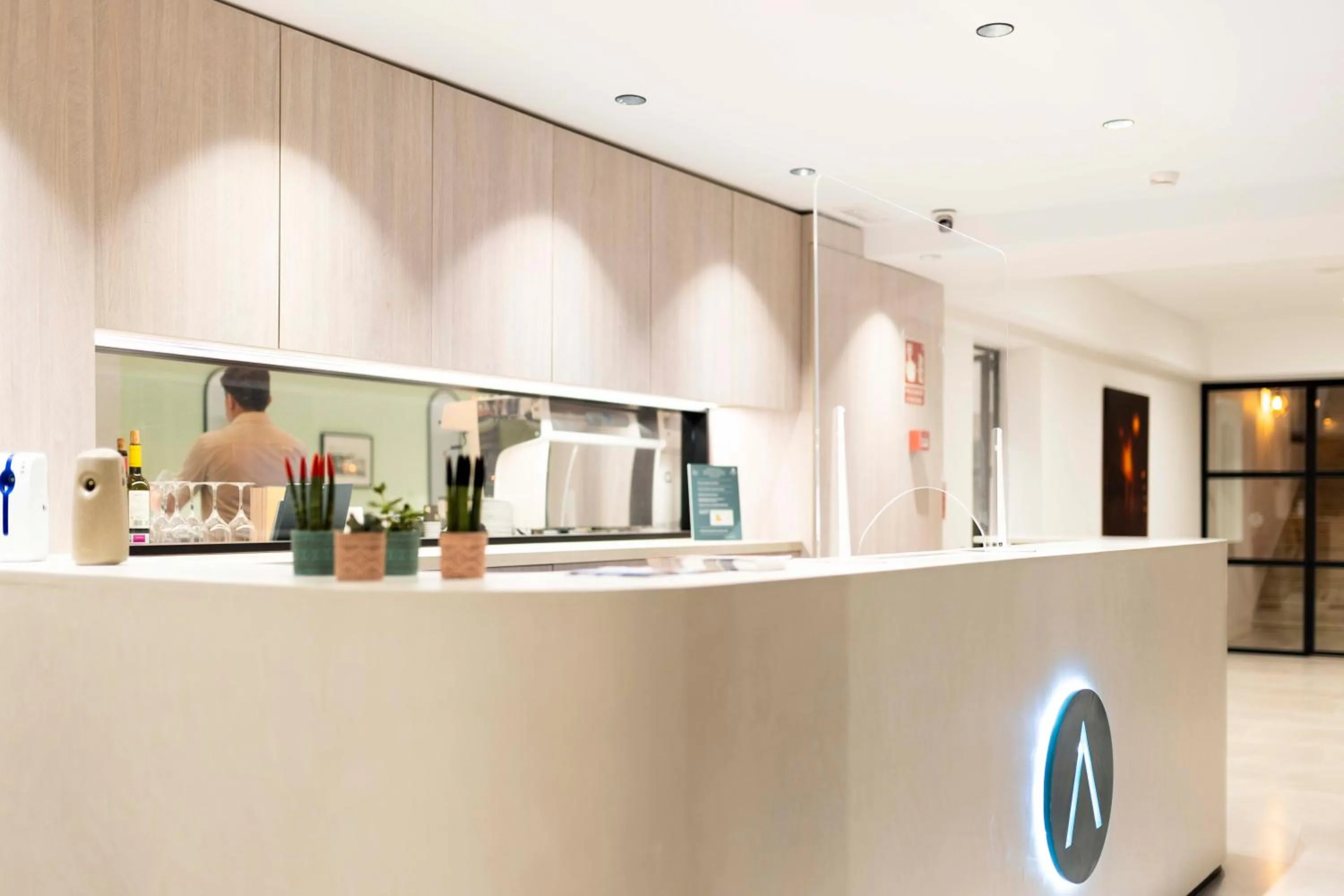 Lobby or reception in Alfons Hotel