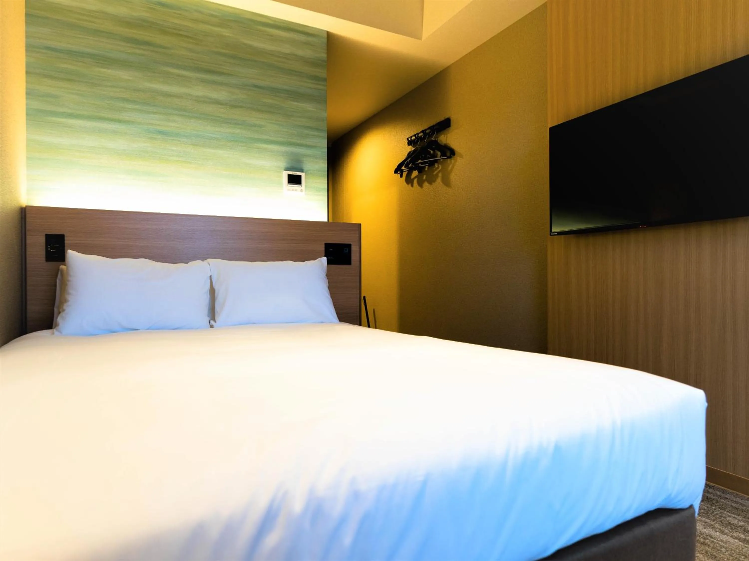 Photo of the whole room, Bed in Hakodate Yunokawa Onsen Umi to Akari Hewitt Resort