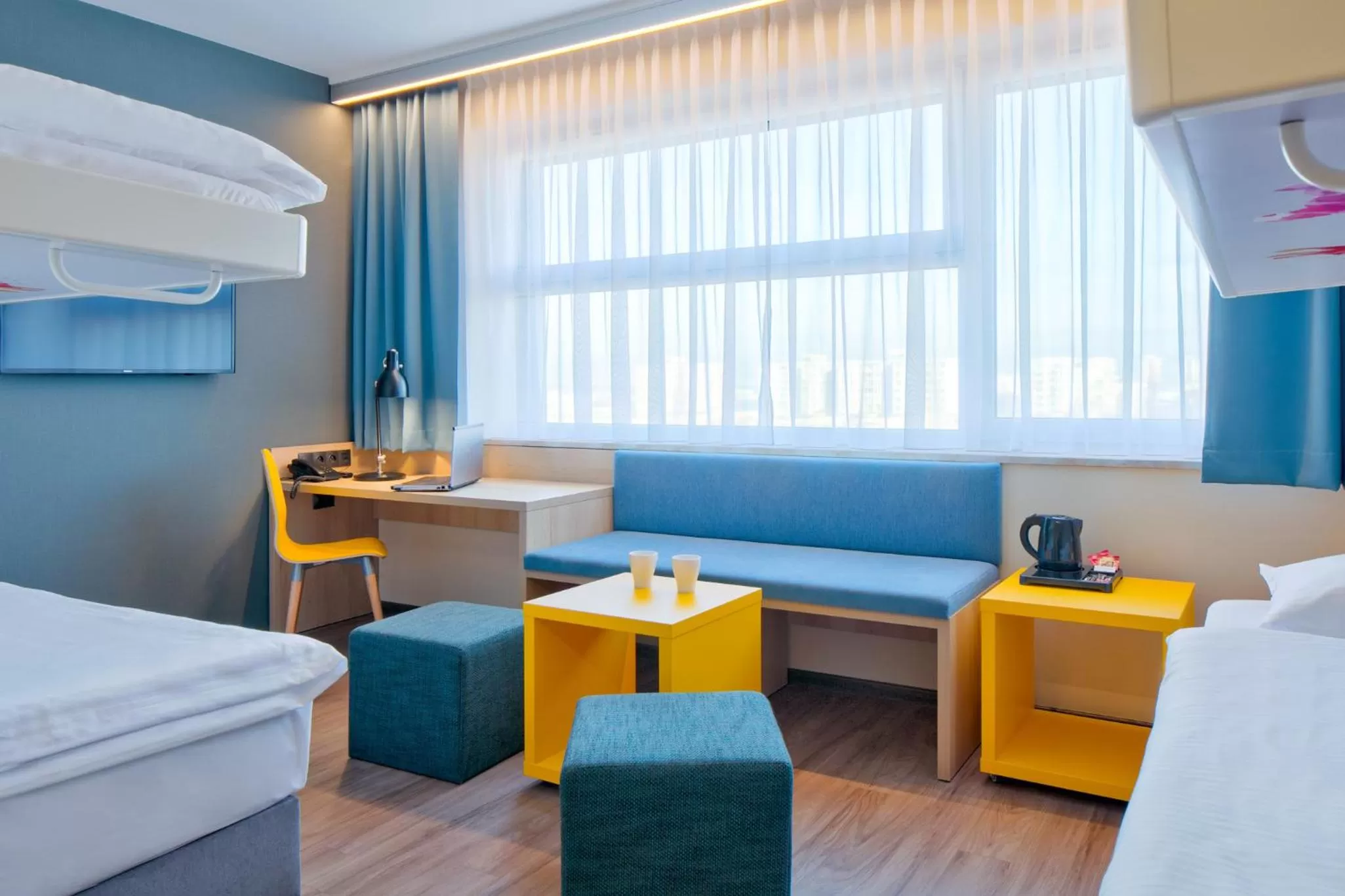 Living room, Bed in o3Hotel