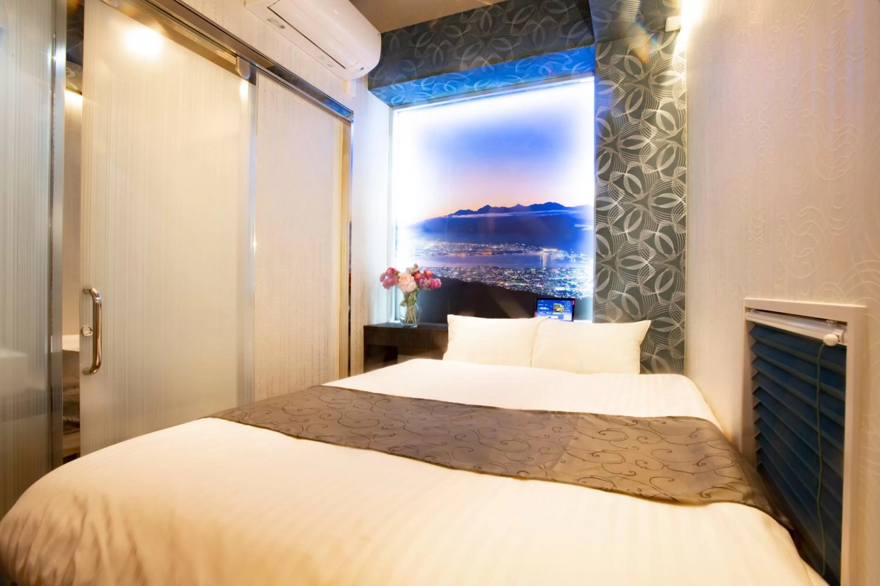 Bed in Pinpon Hotel Hiroshima