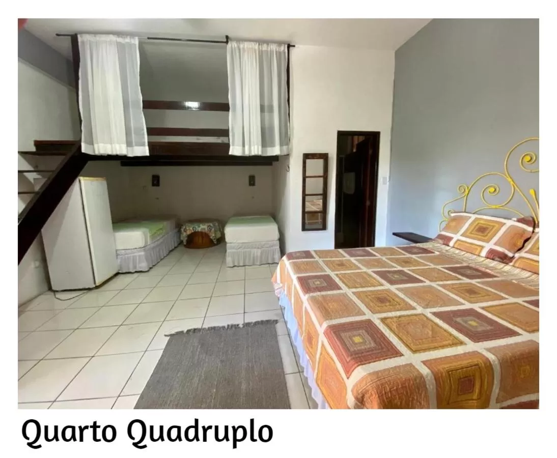 Photo of the whole room, Bed in Pousada Porto Búzios