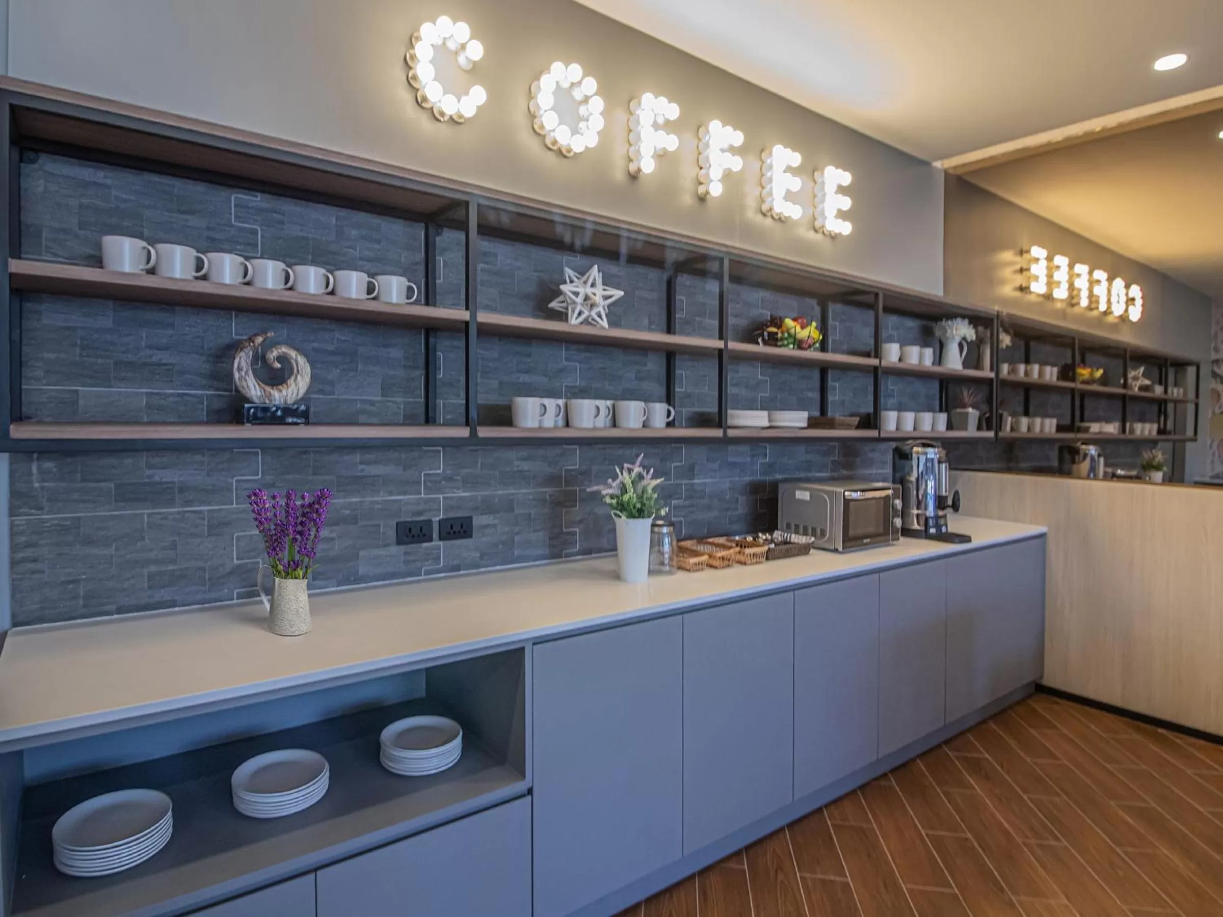 Communal kitchen in Fortune D Hotel Phitsanulok