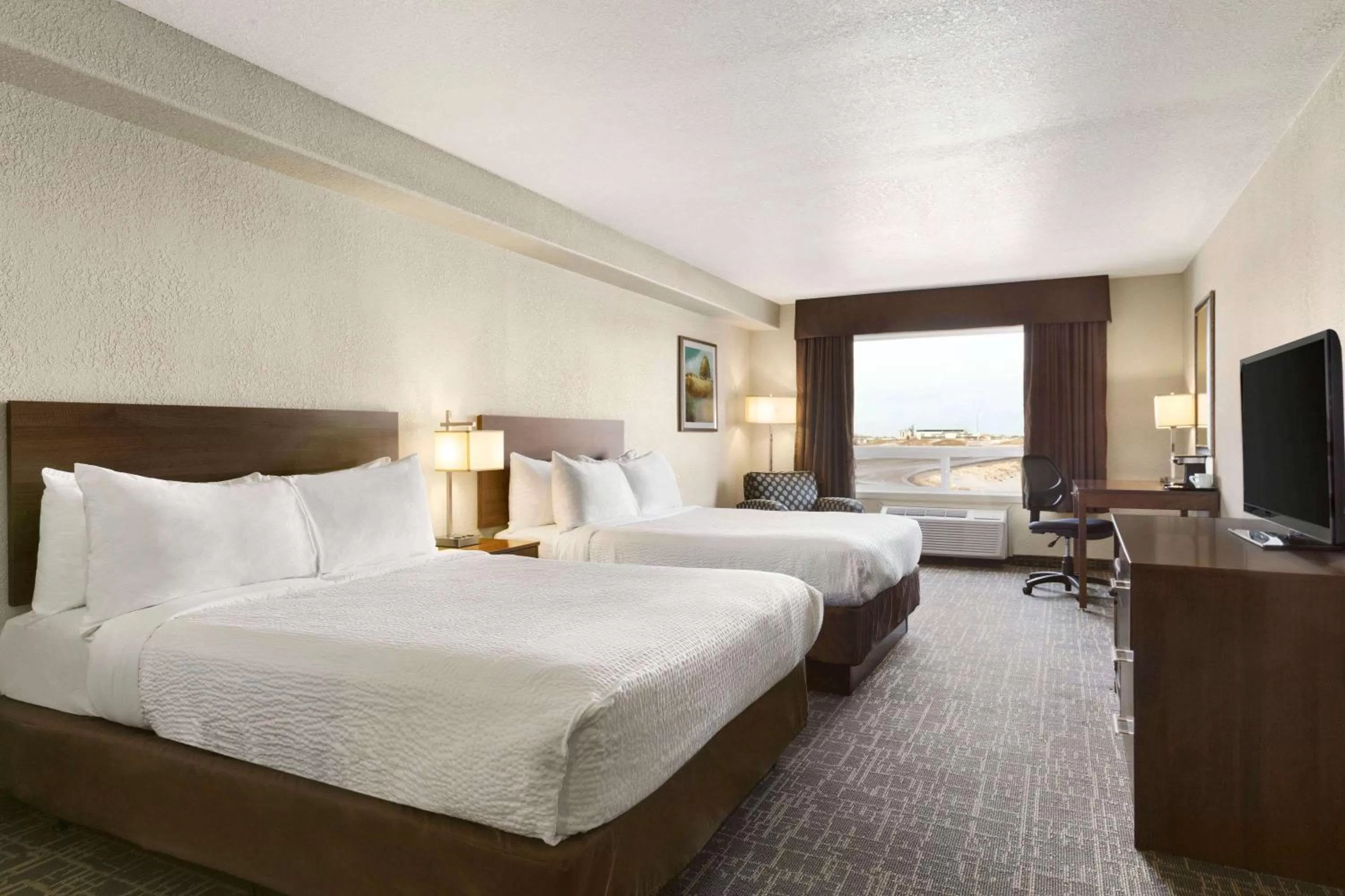 Photo of the whole room, Bed in Days Inn & Suites by Wyndham Yorkton