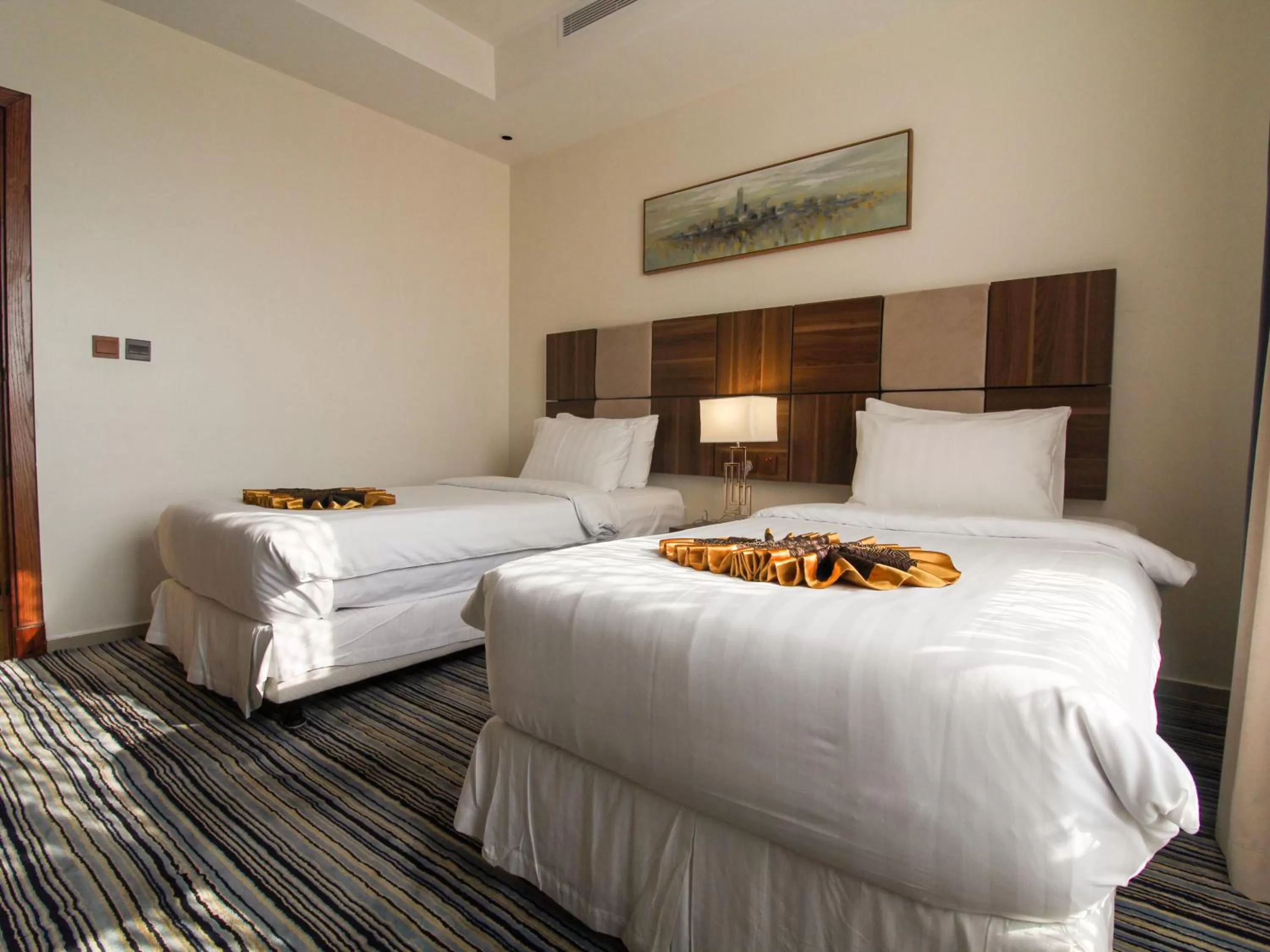 Bed in Friesian Hotel Suites