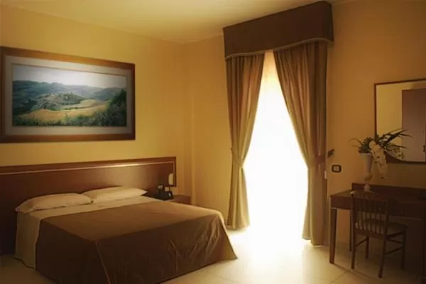 Bed in Hotel Ruffirio