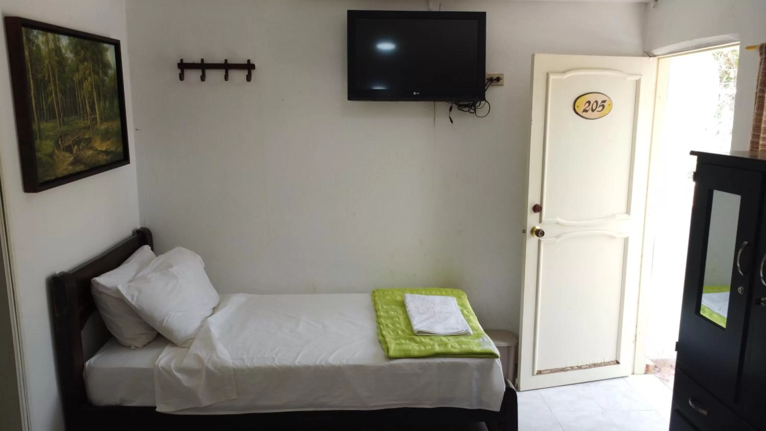 Bedroom, TV/Entertainment Center in Eco-Hotel Villa Elina