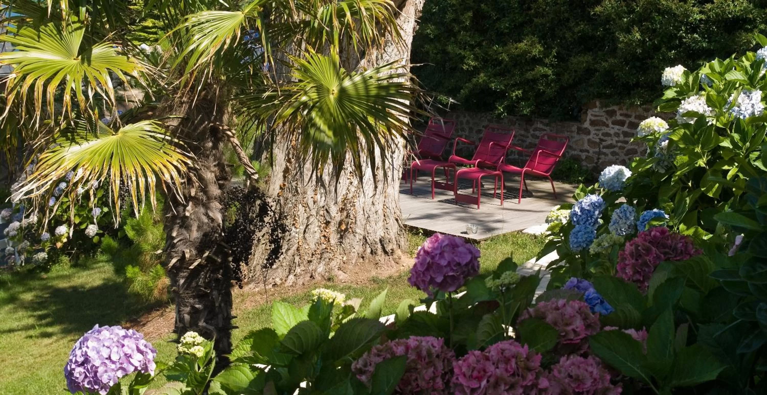 Patio in Hôtel Les Costans, The Originals Relais