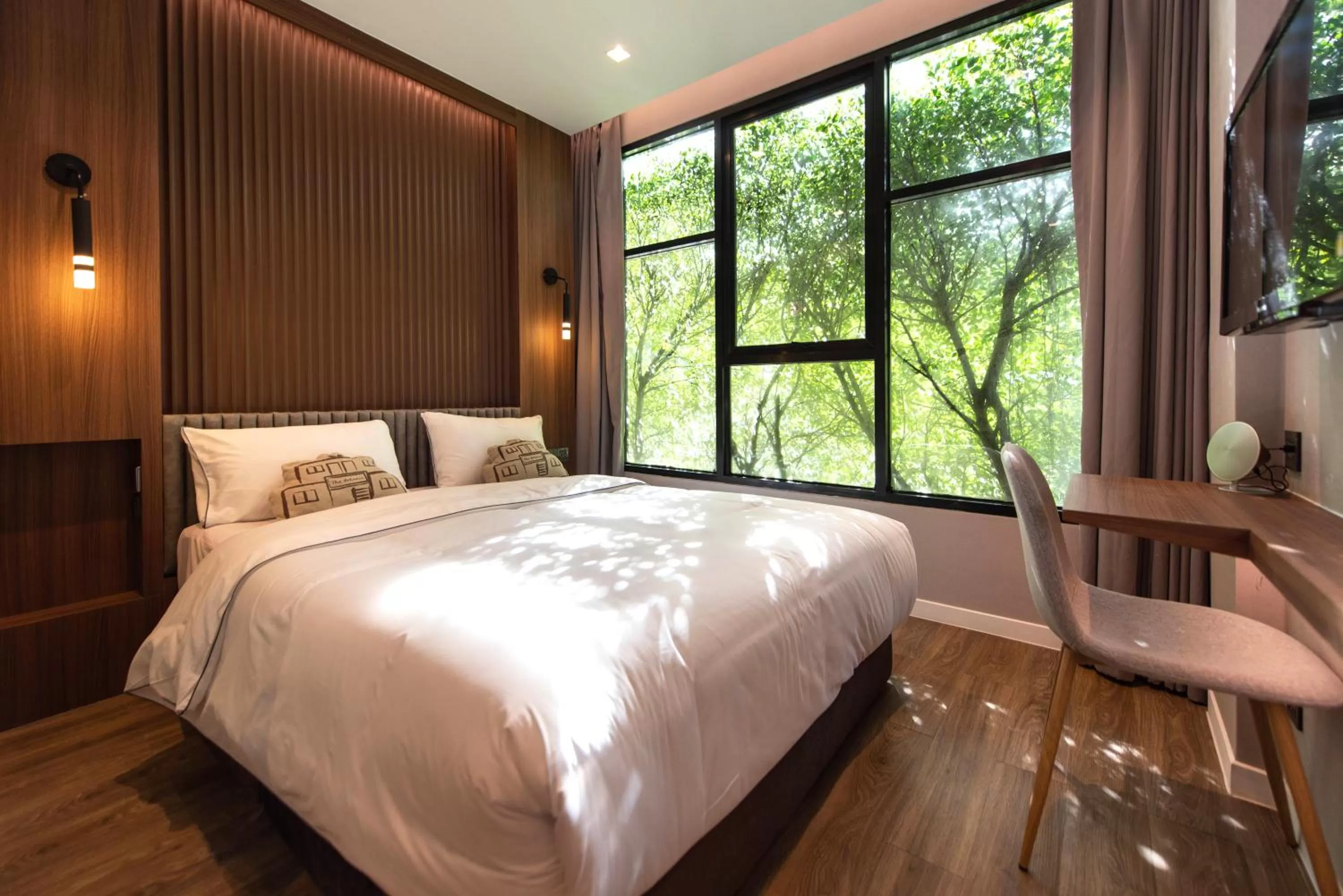 Bed in Botanic Service Room at Impact Muangthongthani - SHA Certified