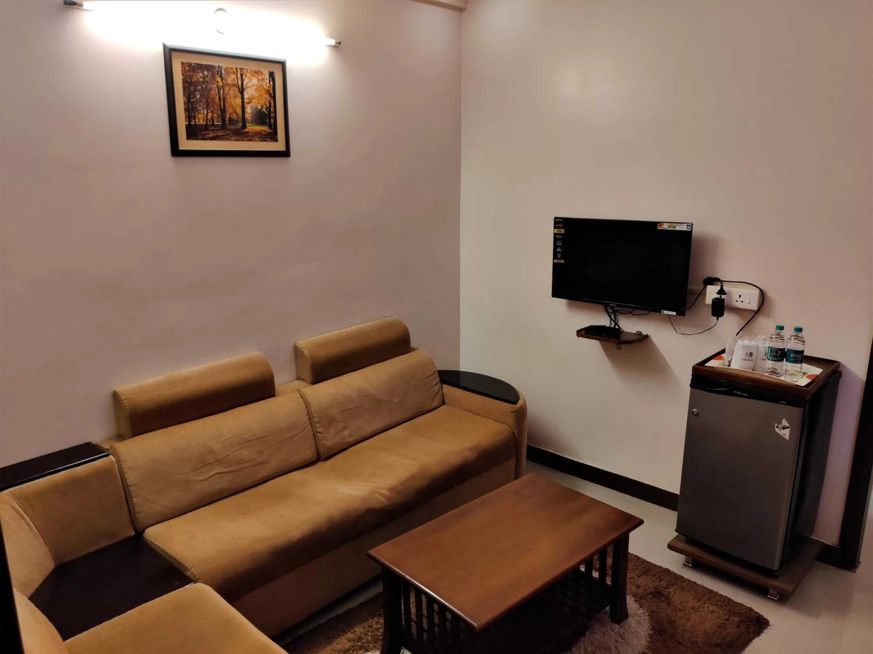 Living room in Metro Plaza Hotel by RAK Rooms, Mangaluru
